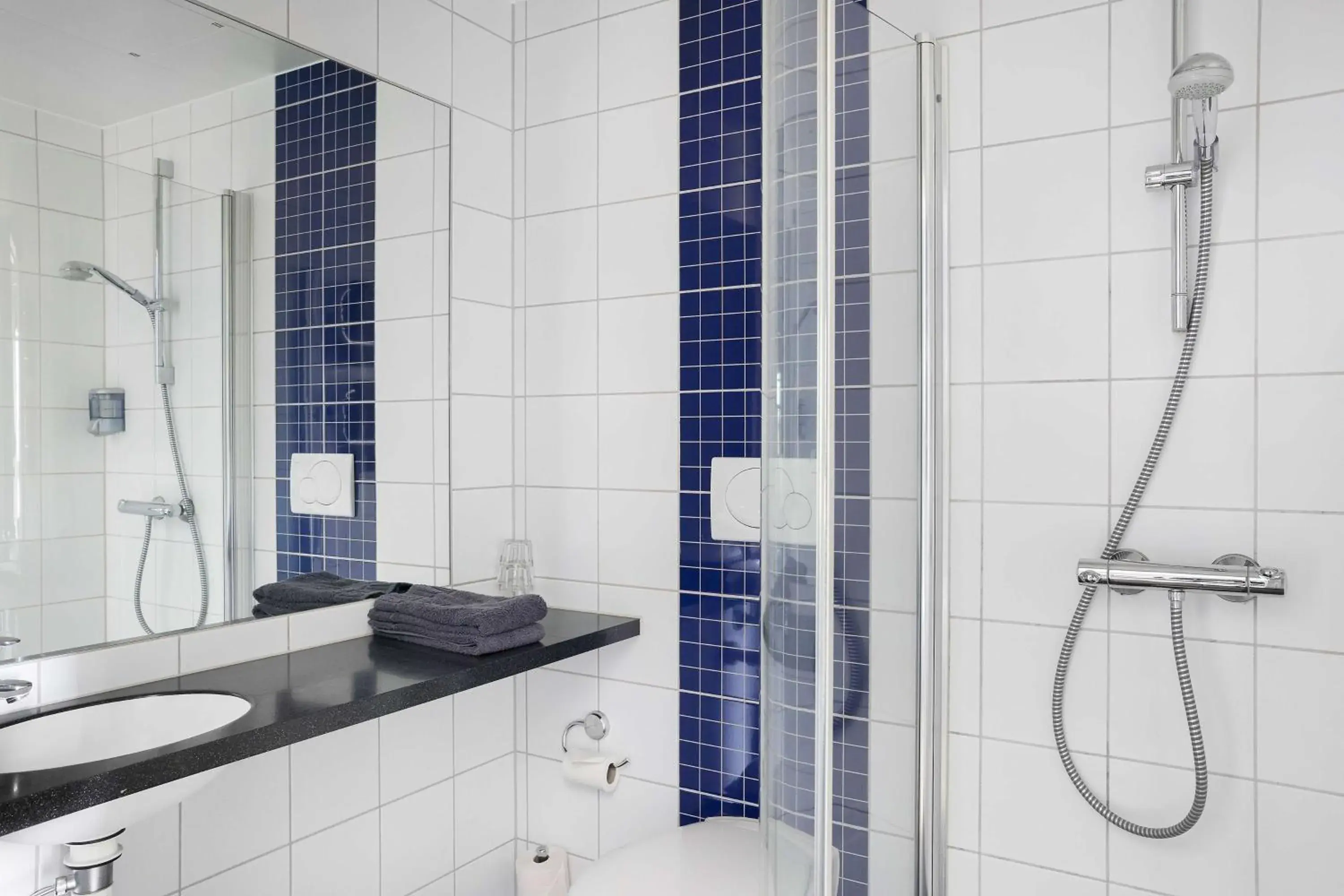 Bathroom in Aiden by Best Western Skavsta Airport Bathroom in Aiden by Best Western Skavsta Airport