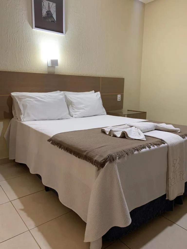 Bed in Fiesta Bahiana Club Hotel