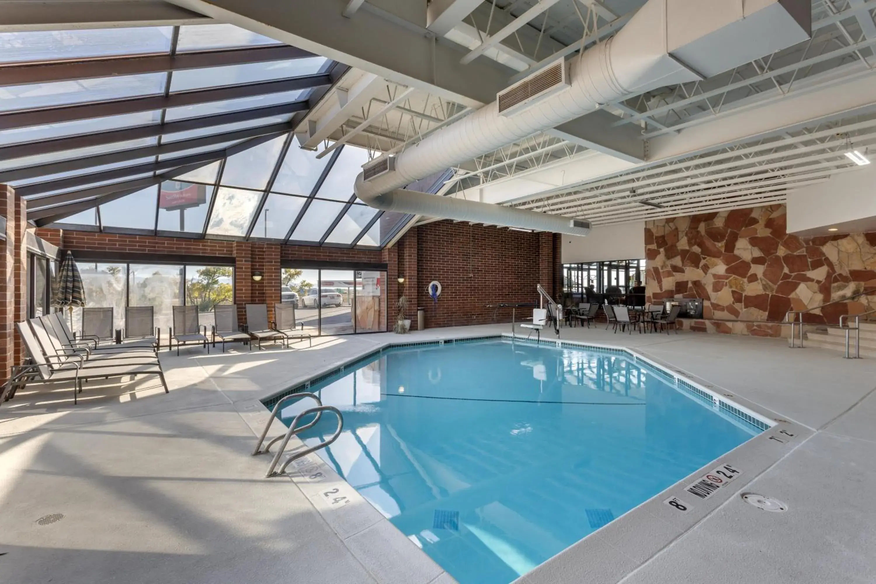 Pool view in SureStay Plus Hotel by Best Western Price Pool view in SureStay Plus Hotel by Best Western Price