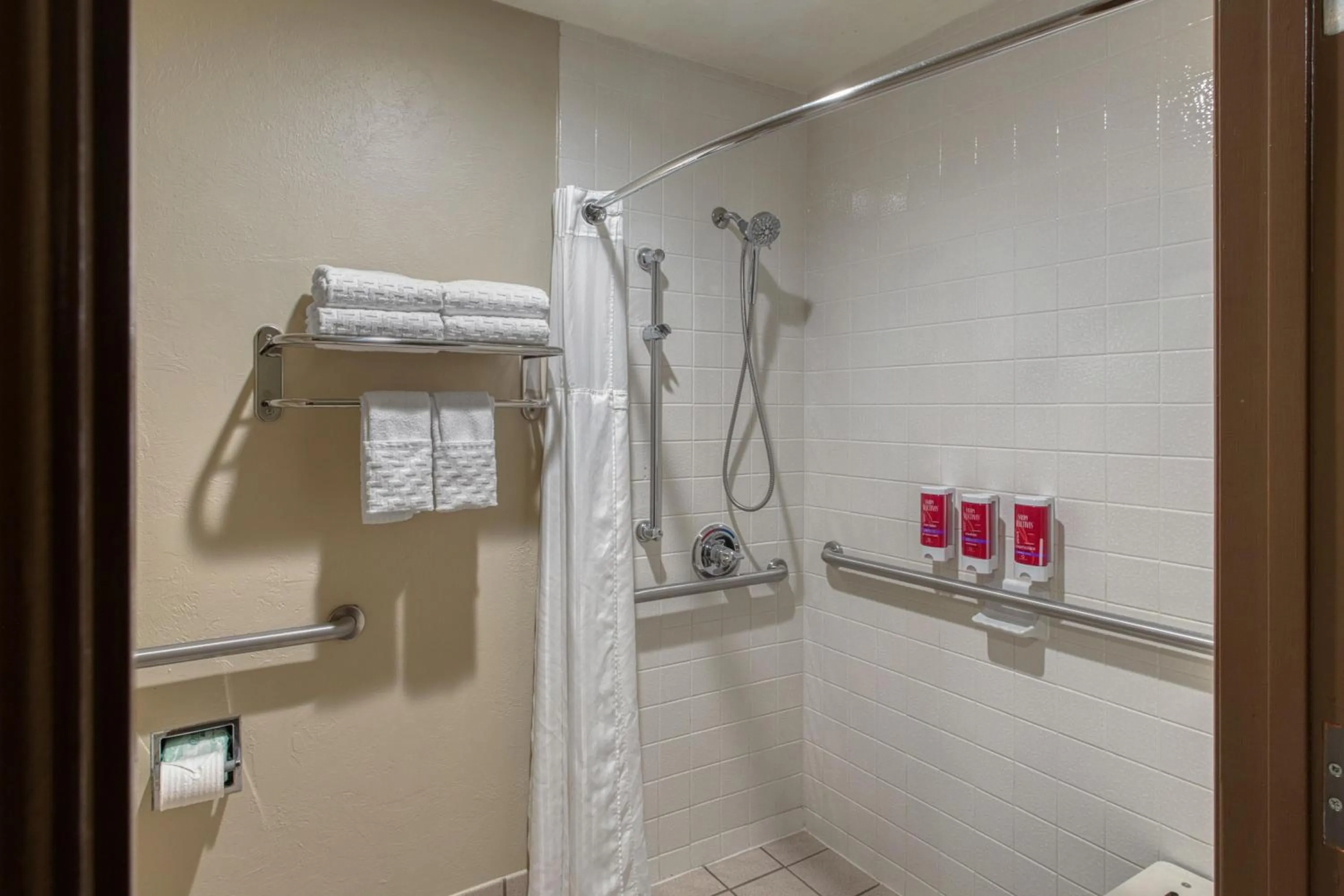 Bathroom in SureStay Plus Hotel by Best Western Price