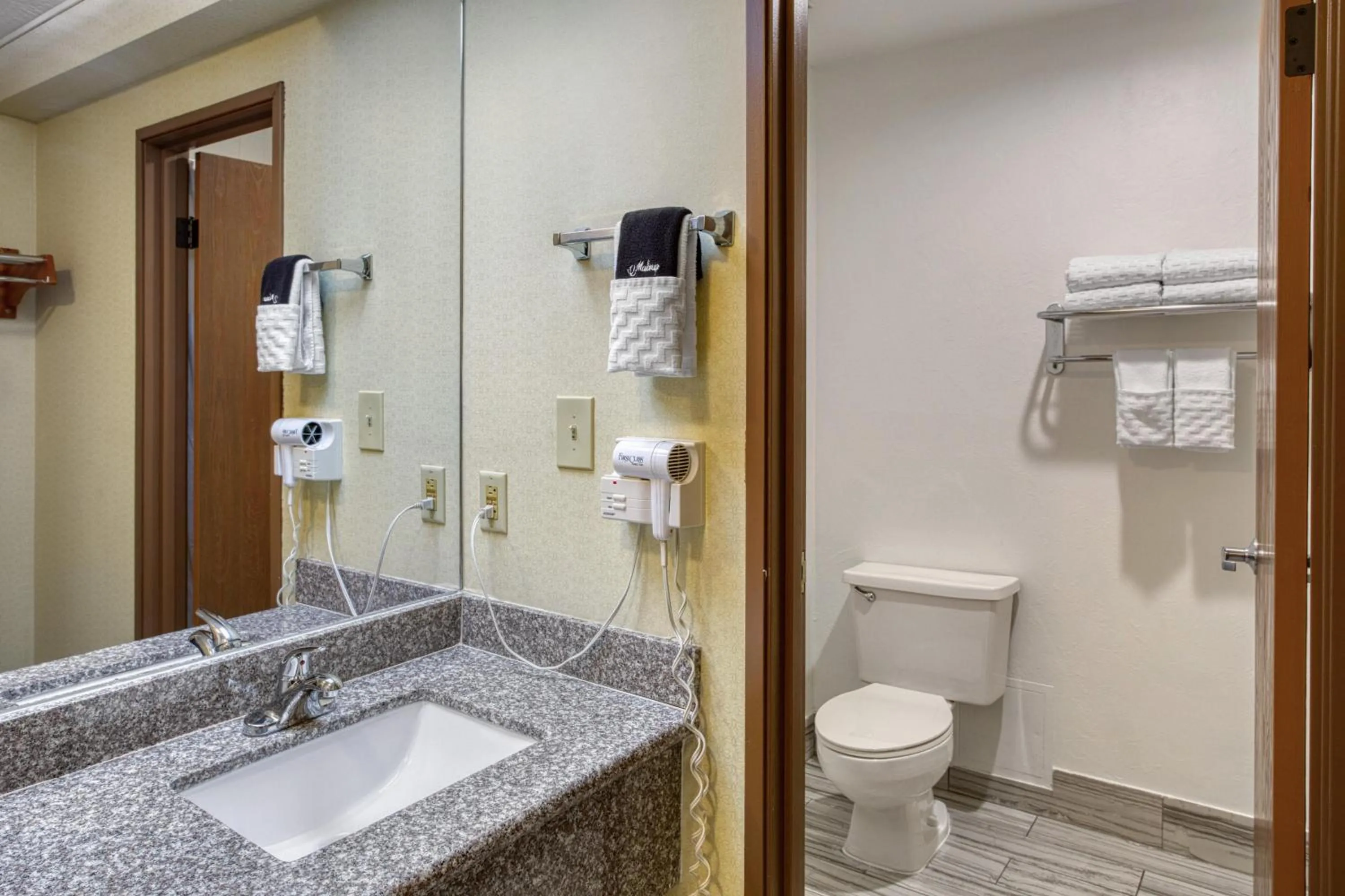 Bathroom in SureStay Plus Hotel by Best Western Price