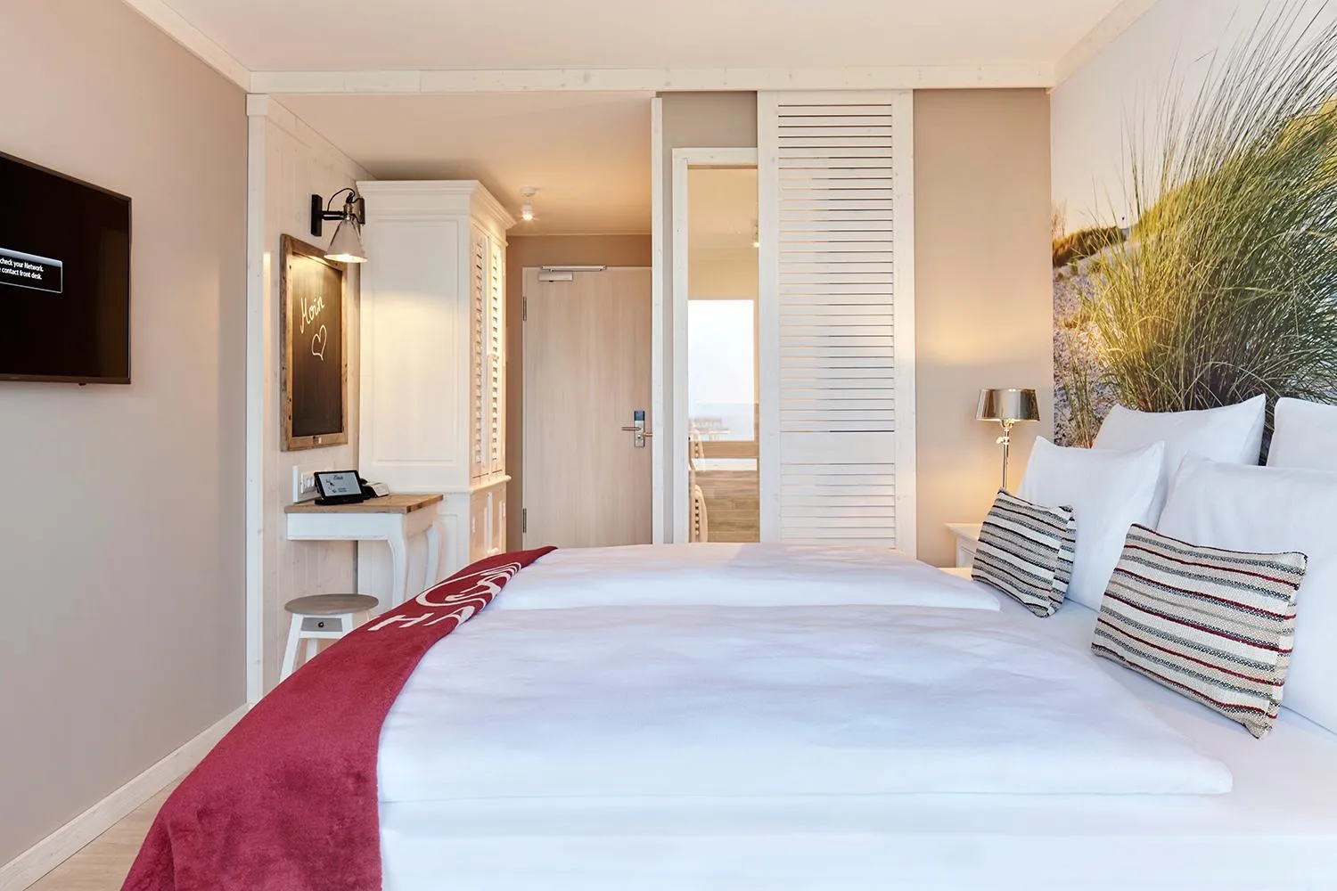 Photo of the whole room, Bed in Beach Motel Heiligenhafen