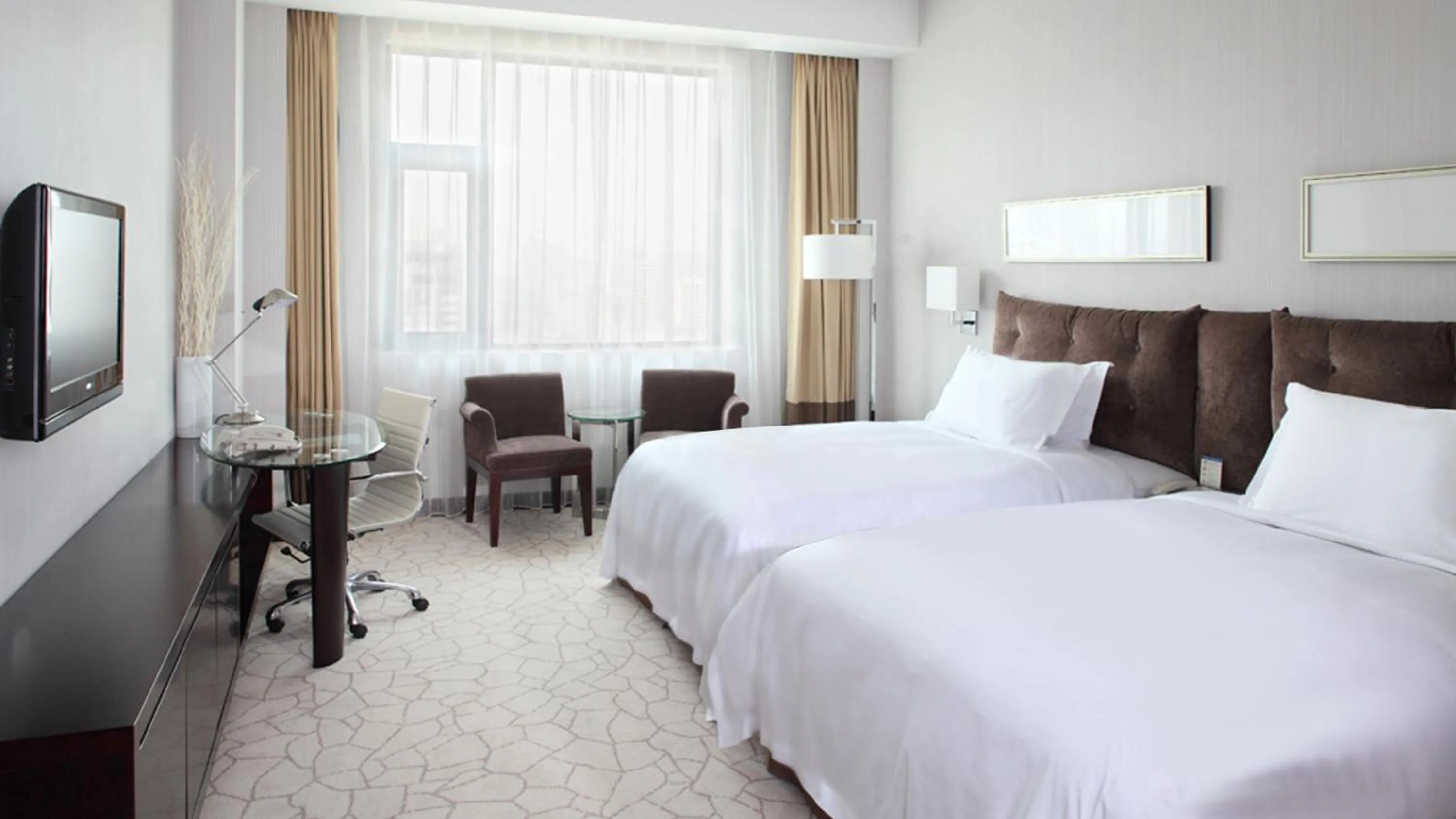 Photo of the whole room, Bed in Holiday Inn Beijing Deshengmen by IHG