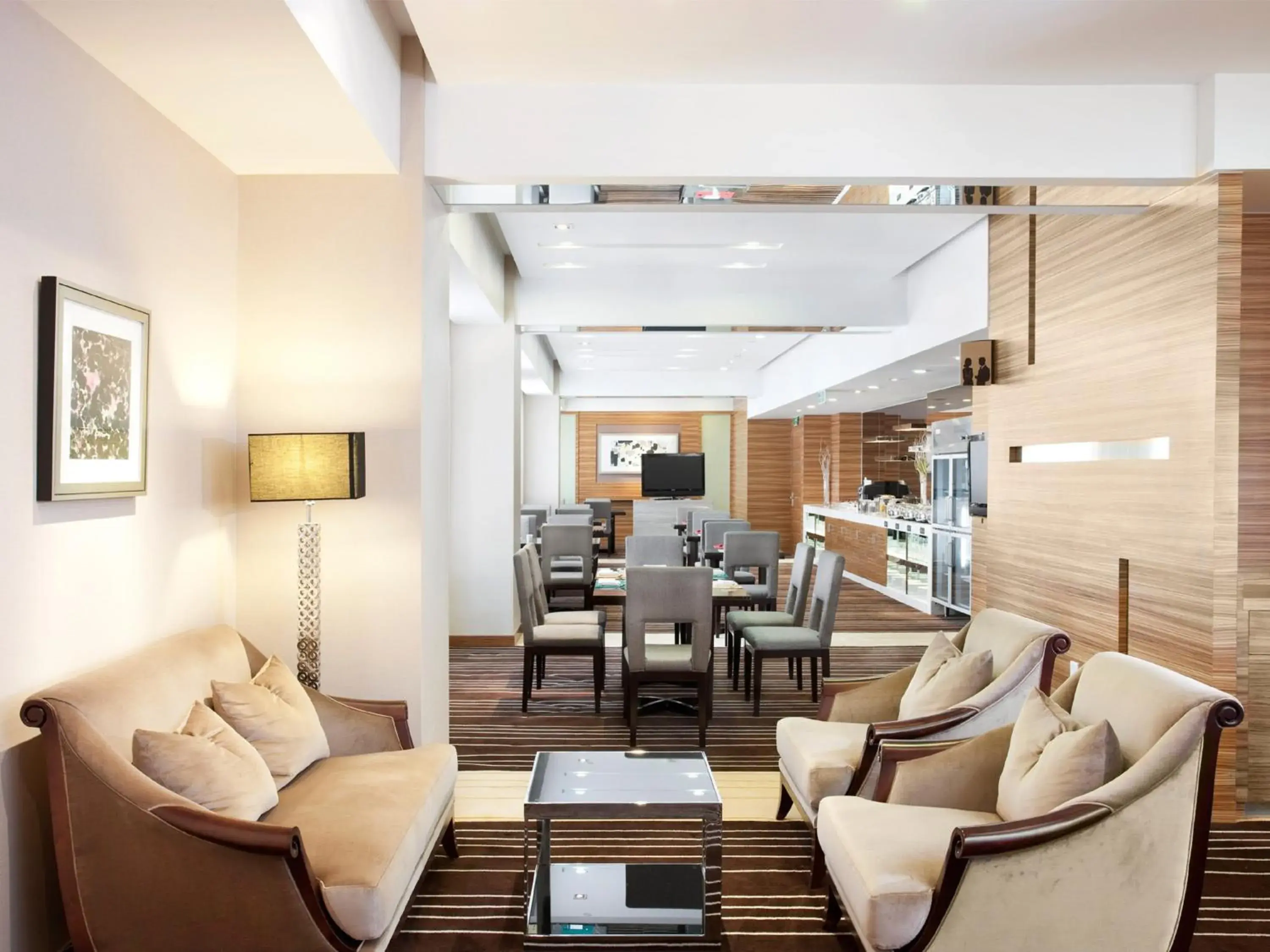 Lounge or bar in Holiday Inn Beijing Deshengmen by IHG on 2nd Ring Road Extension 10-15 minute taxi ride to Shichahai Lama Temple Drum Tower Close to Beijing North Station for Badaling Great Wall Near Exit B Jishuitan Metro Line 2 Lounge or bar in Holiday Inn Beijing Deshengmen by IHG on 2nd Ring Road Extension 10-15 minute taxi ride to Shichahai Lama Temple Drum Tower Close to Beijing North Station for Badaling Great Wall Near Exit B Jishuitan Metro Line 2