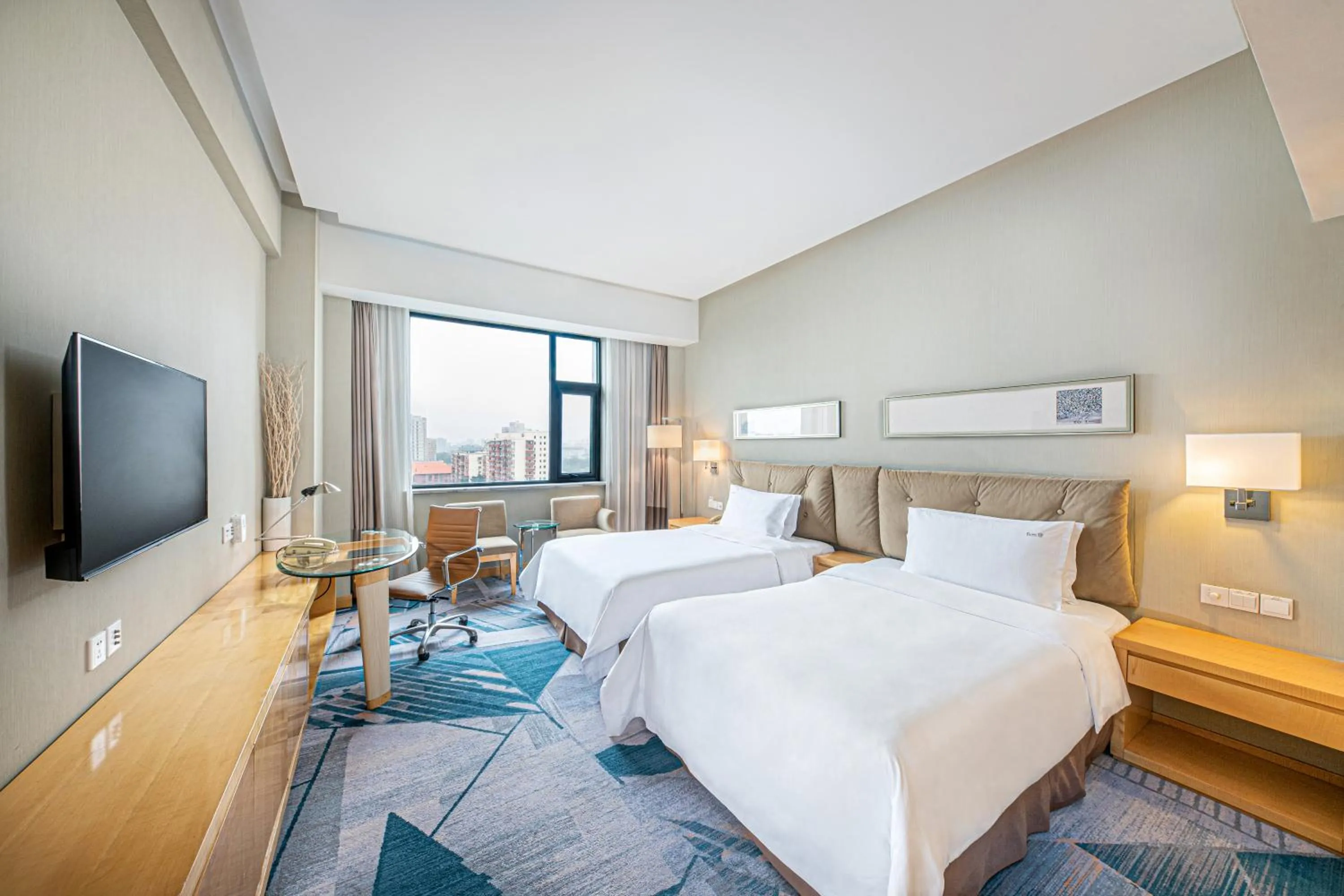 Photo of the whole room, Bed in Holiday Inn Beijing Deshengmen by IHG