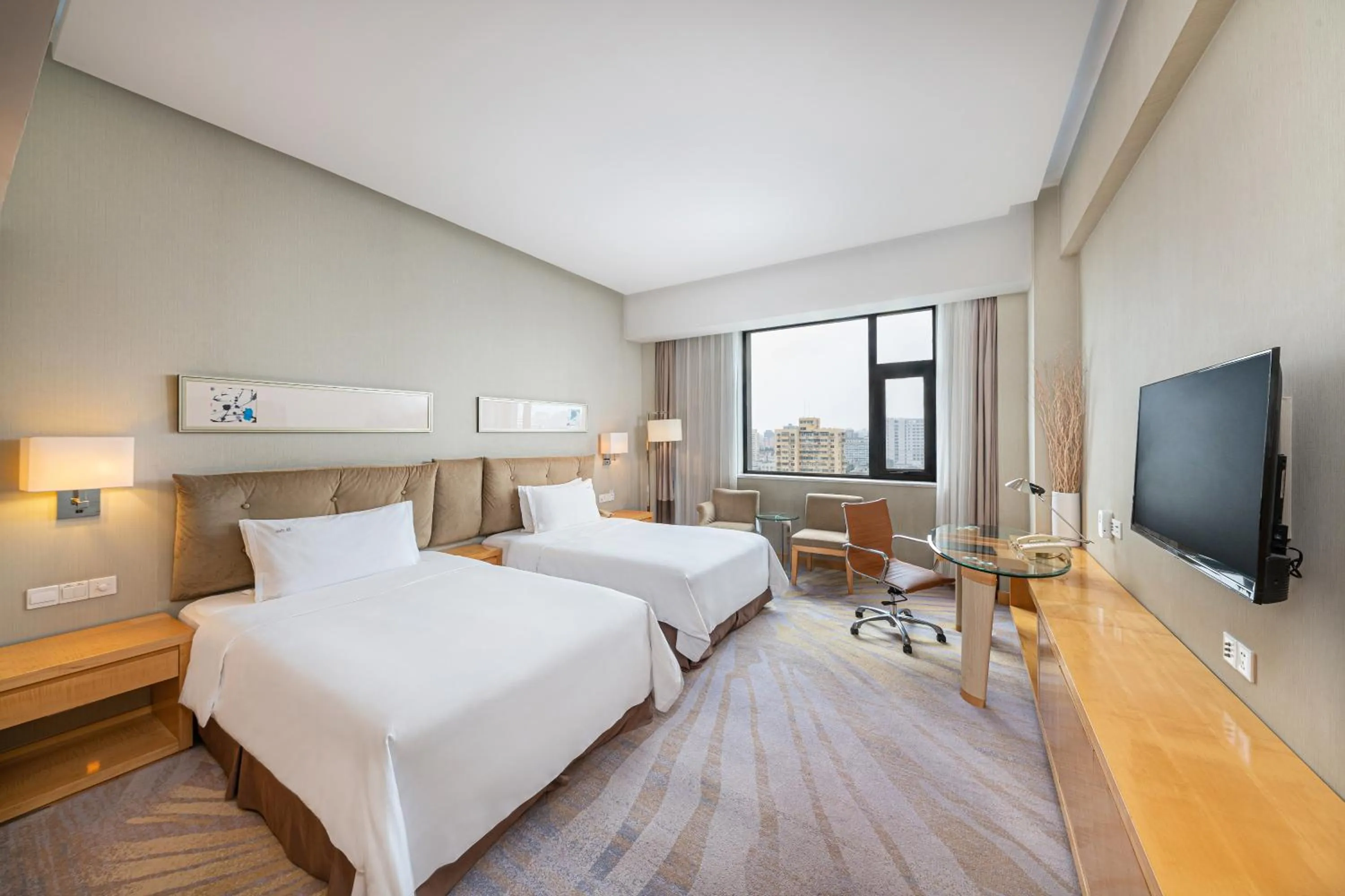 Photo of the whole room, Bed in Holiday Inn Beijing Deshengmen by IHG