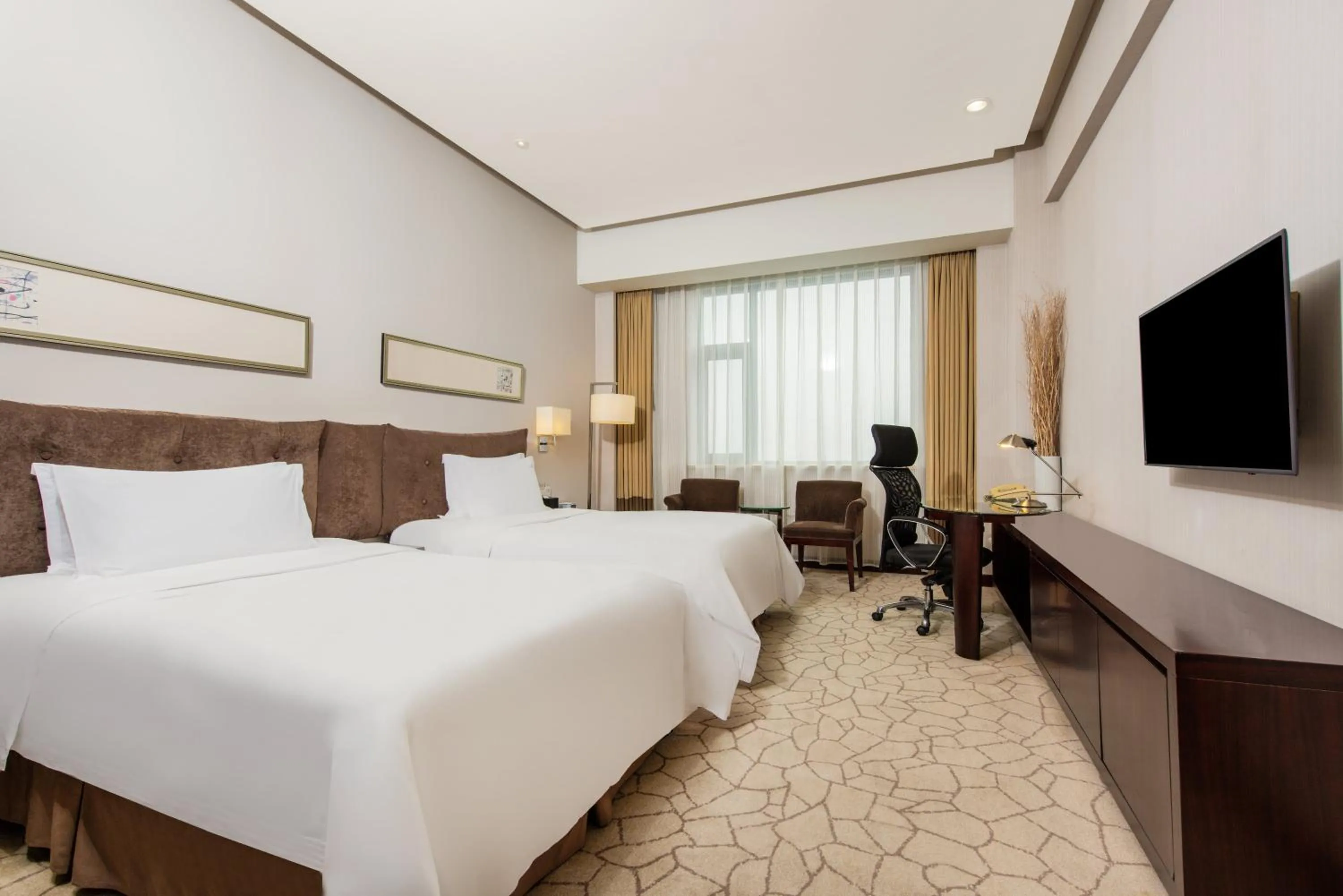 Photo of the whole room, Bed in Holiday Inn Beijing Deshengmen by IHG
