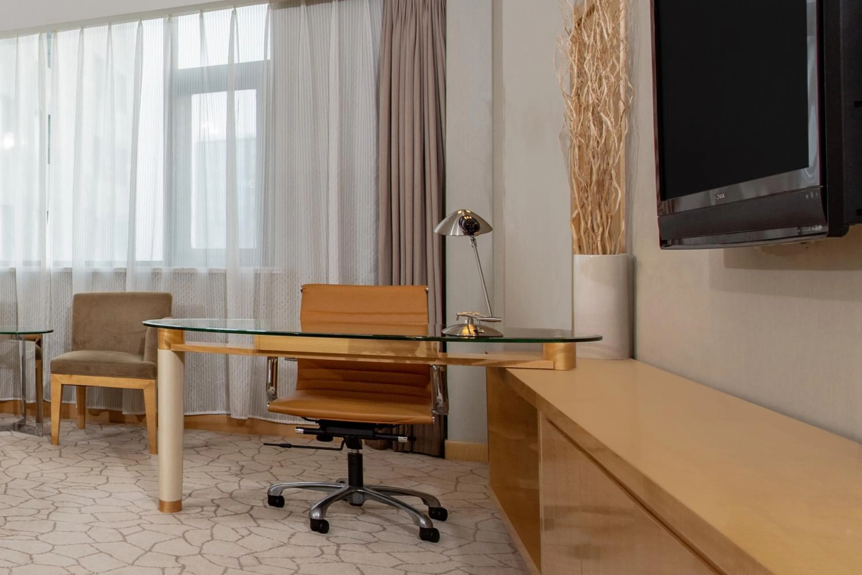 Seating area in Holiday Inn Beijing Deshengmen by IHG