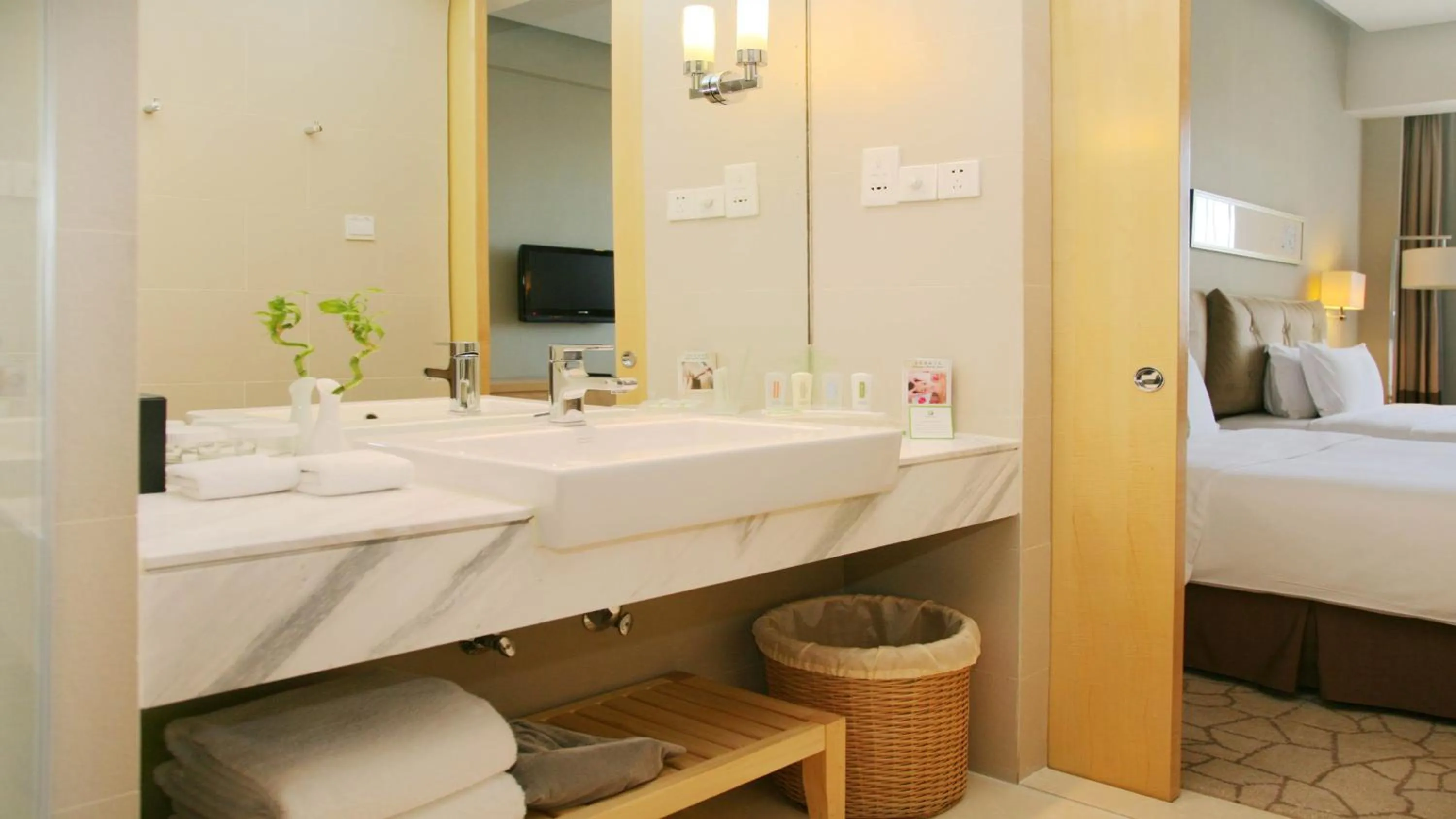 Photo of the whole room, Bed in Holiday Inn Beijing Deshengmen by IHG