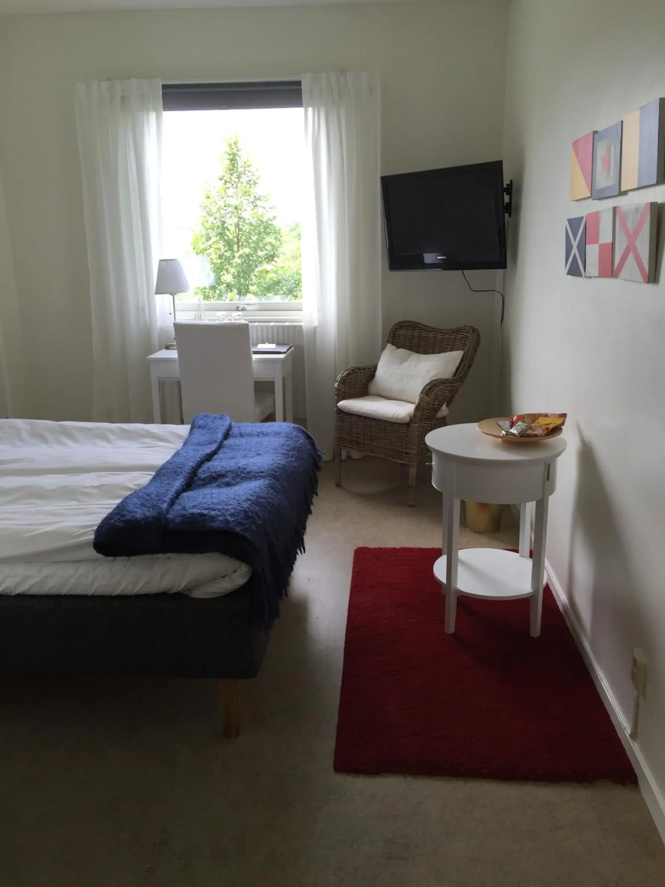 Photo of the whole room, Bed in Nynäsgården Hotell & Konferens Photo of the whole room, Bed in Nynäsgården Hotell & Konferens