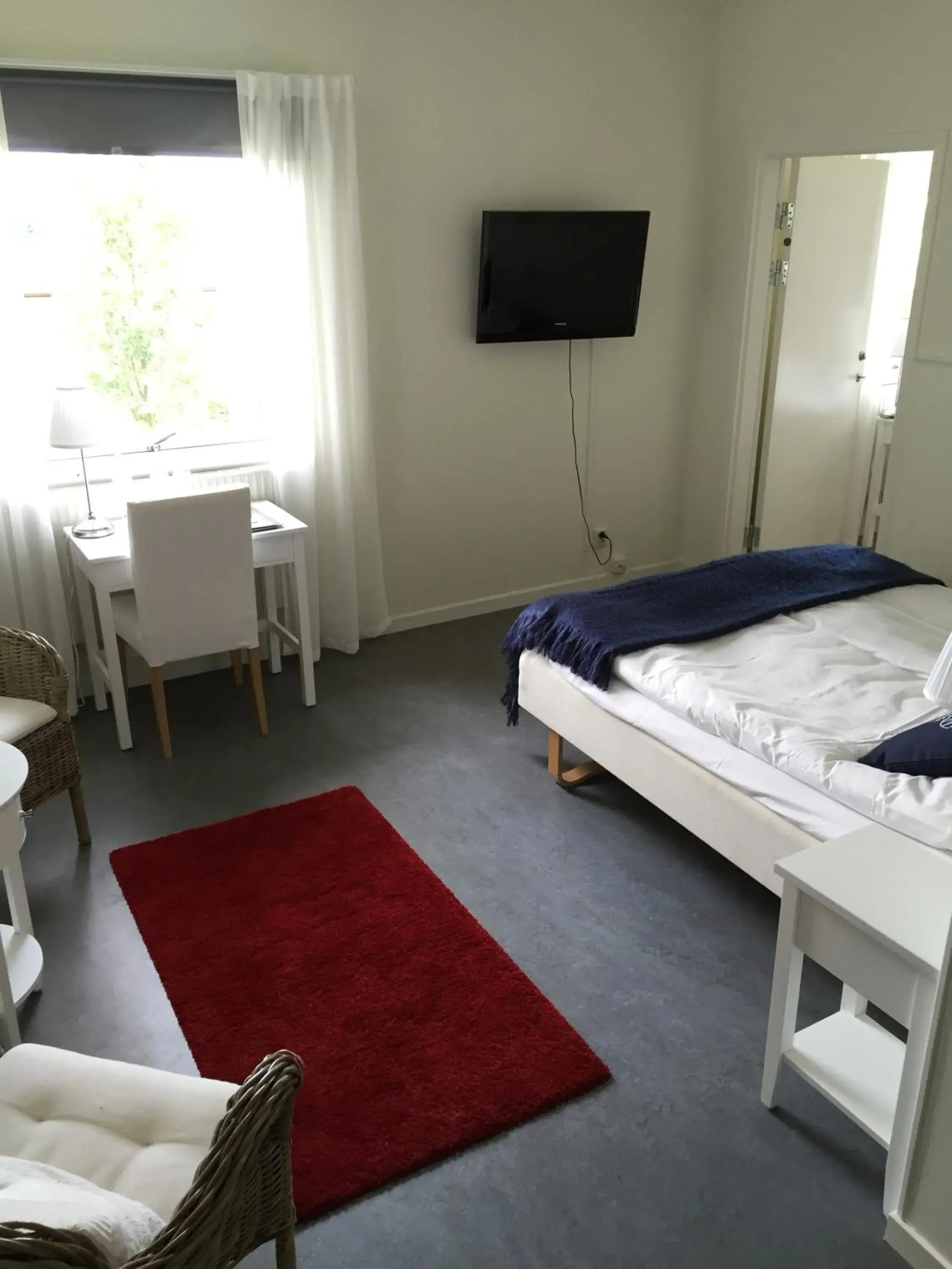 Photo of the whole room, Bed in Nynäsgården Hotell & Konferens Photo of the whole room, Bed in Nynäsgården Hotell & Konferens