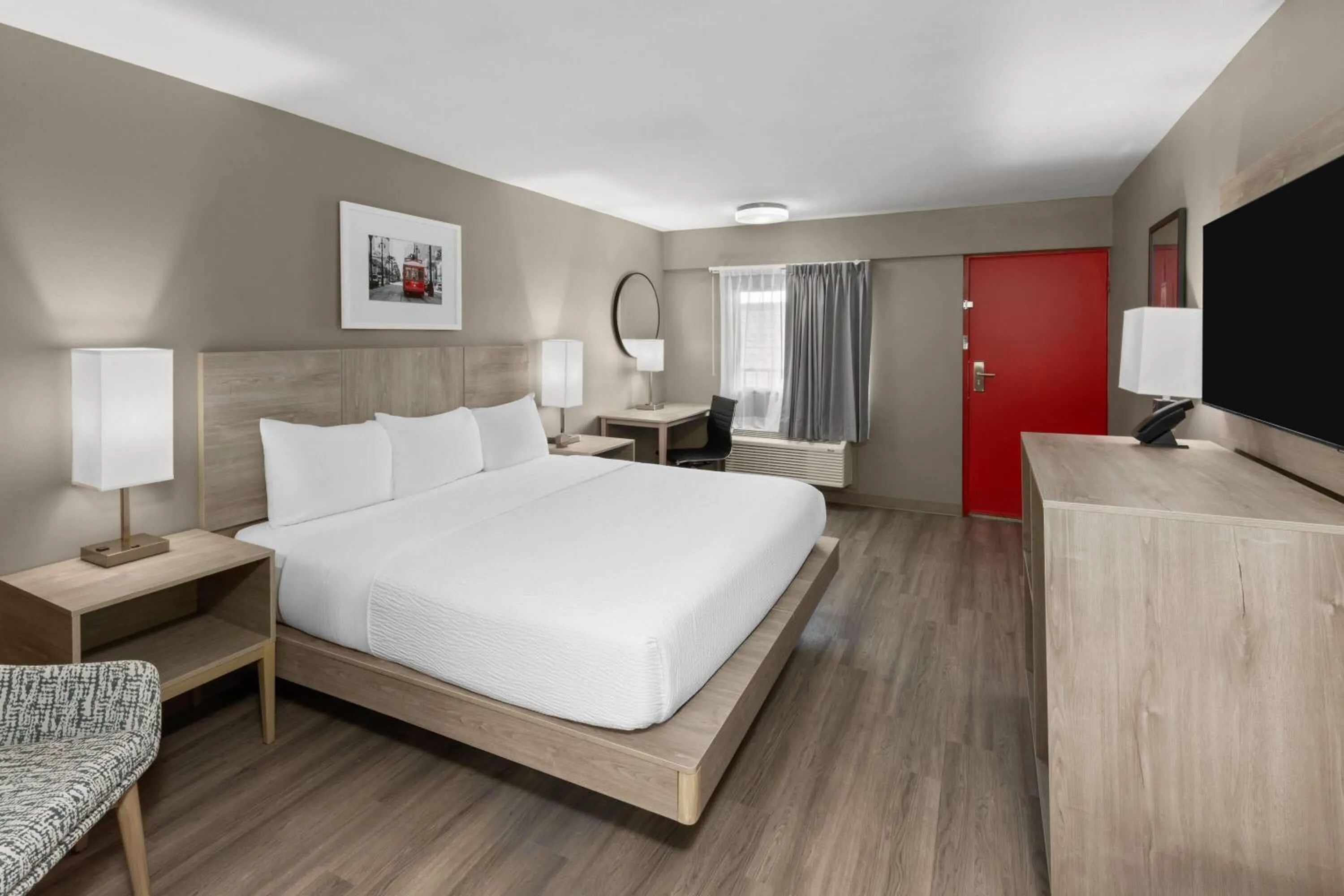 Photo of the whole room, Bed in Ramada by Wyndham Kenner New Orleans Airport South