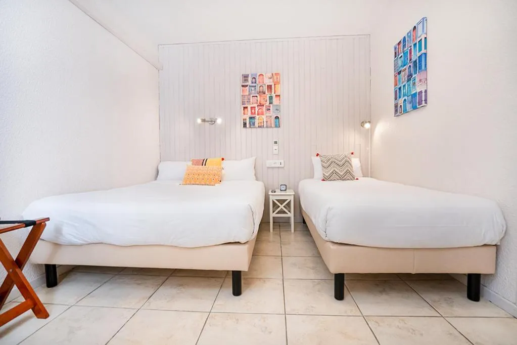 Bedroom, Bed in Logis Hôtel- Hôtel Restaurant Le Rialto