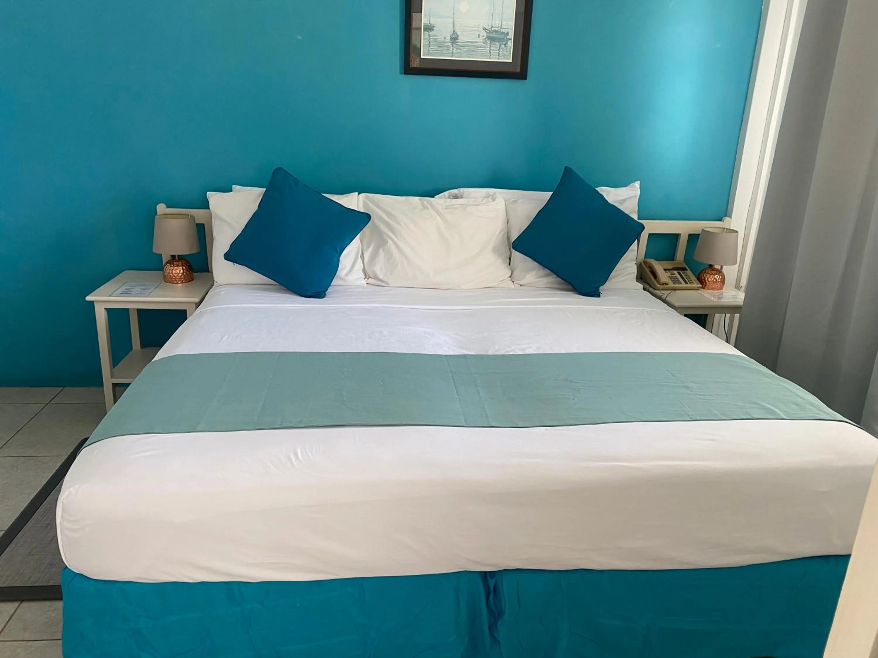 Bed in Melrose Beach Apartments Inc