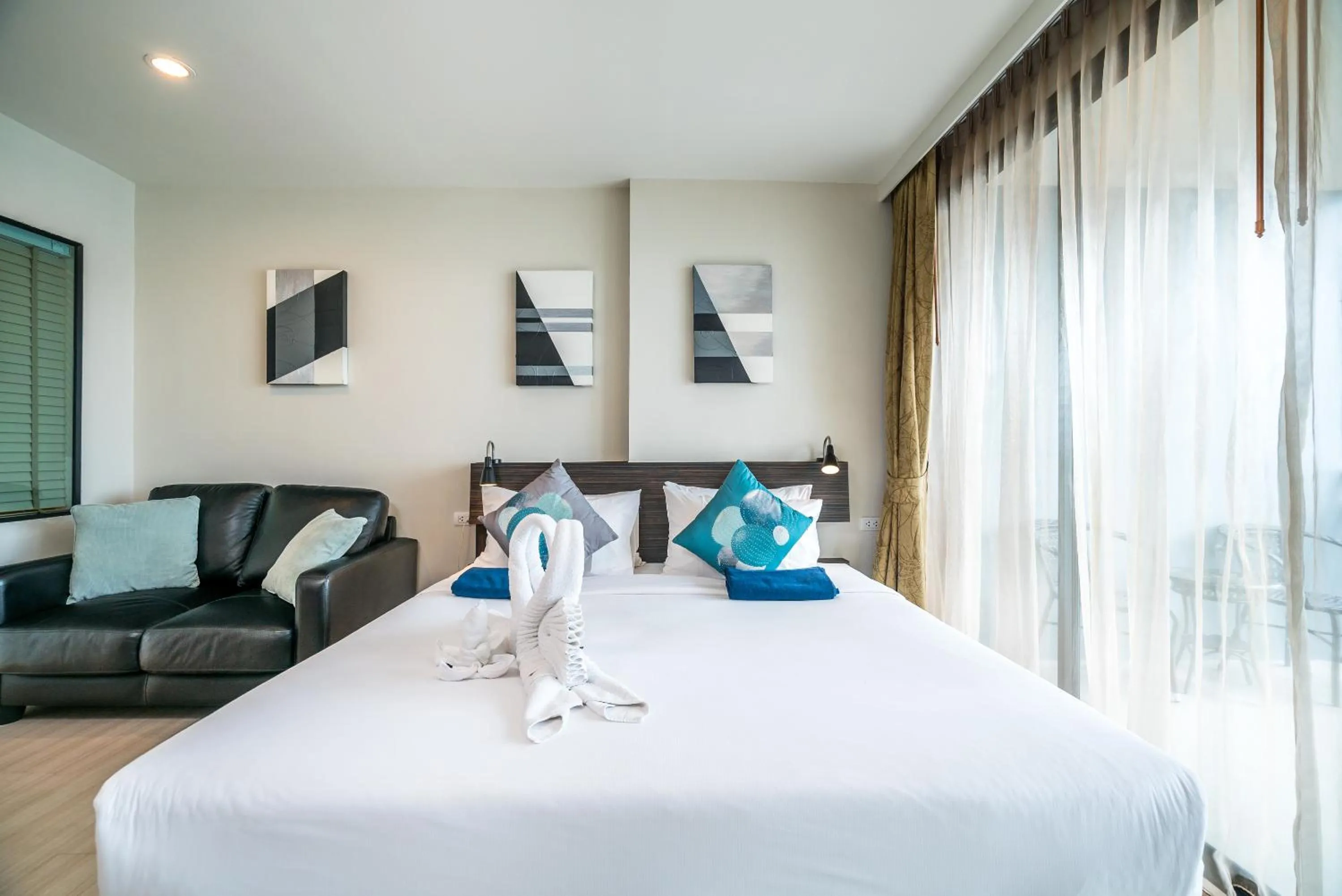 Bed in Apartments at The Bliss Condo by Lofty