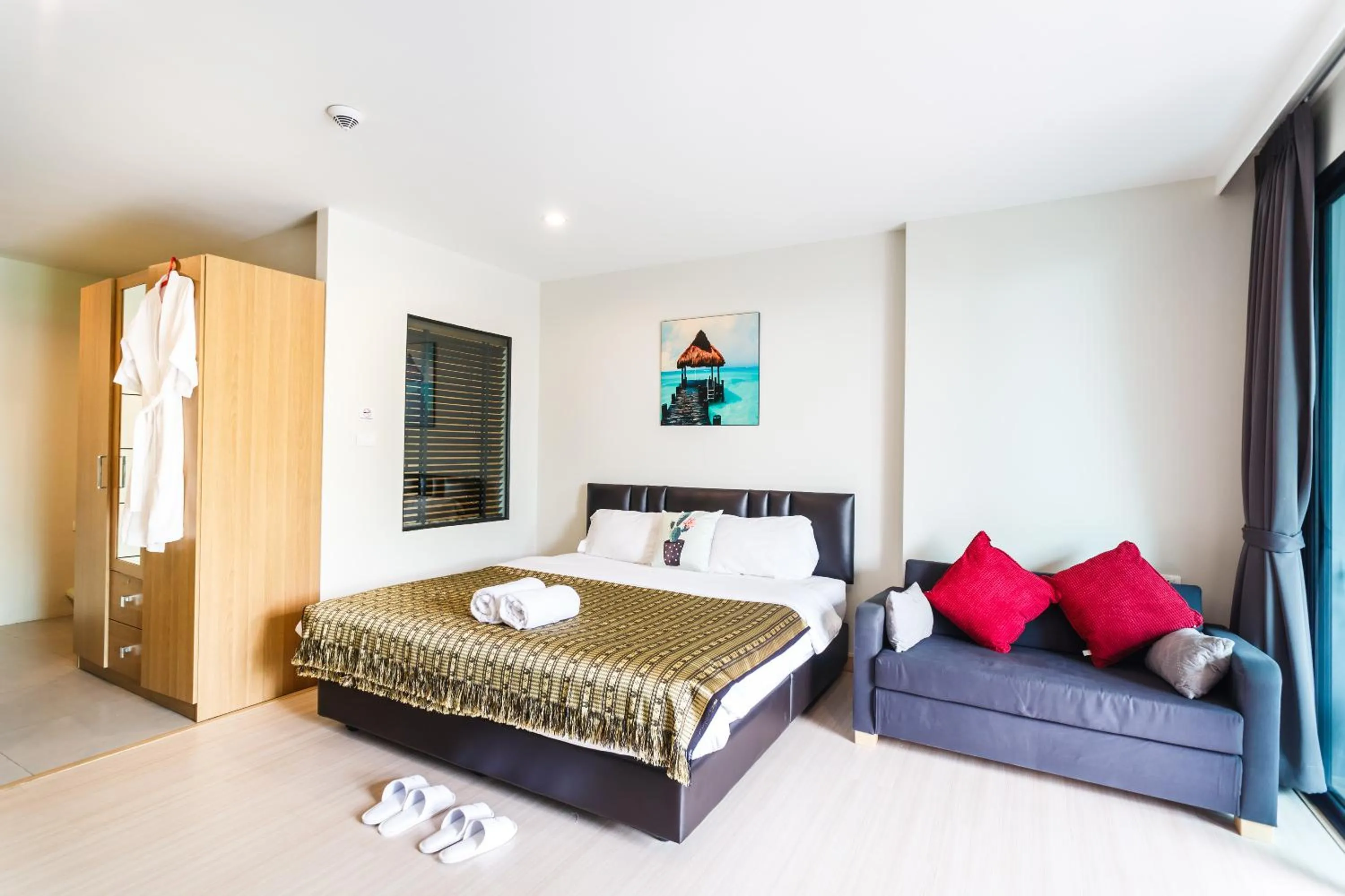Bedroom, Bed in Apartments at The Bliss Condo by Lofty