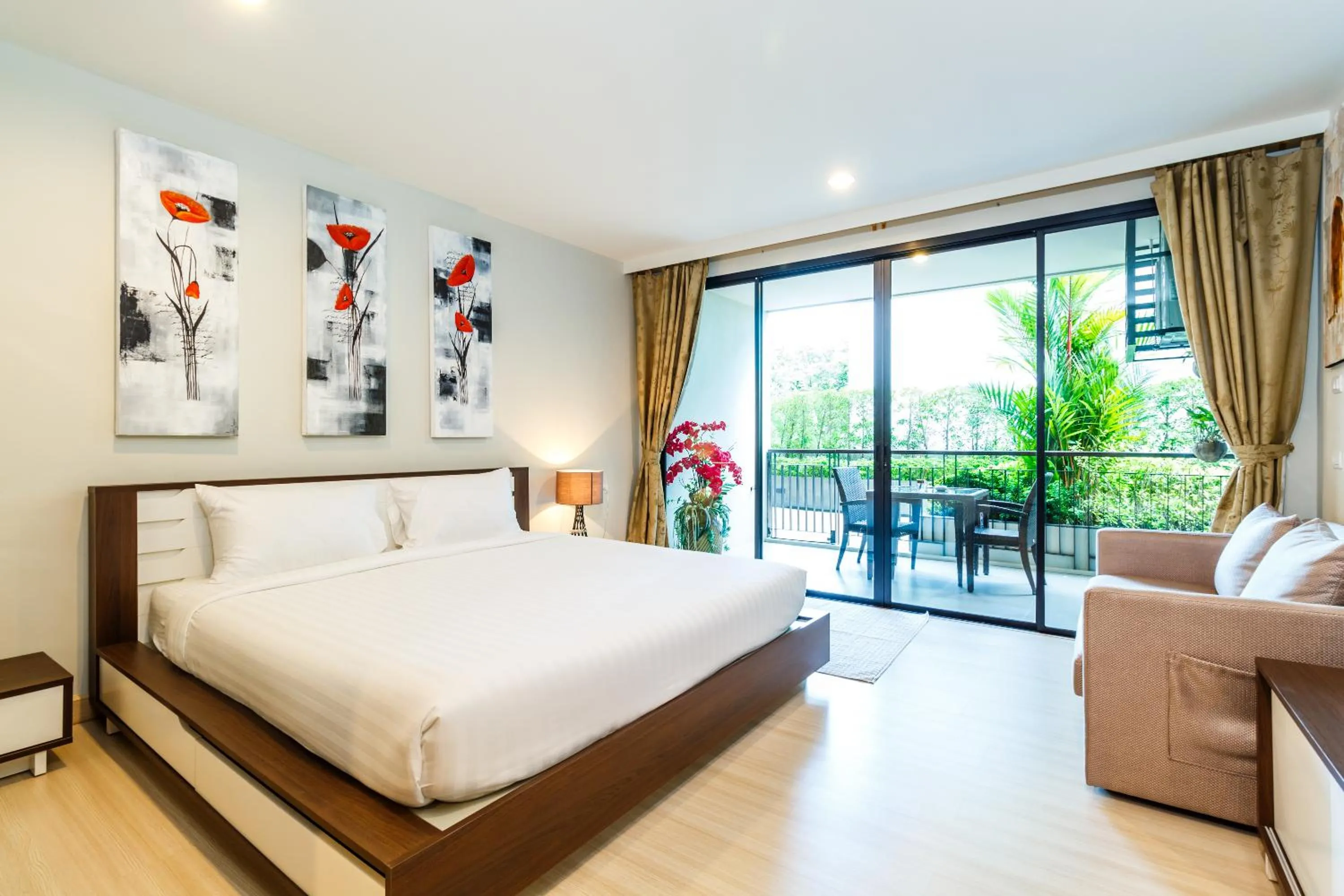 Balcony/Terrace, Bed in Apartments at The Bliss Condo by Lofty