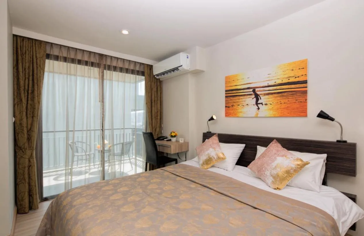 Bed in Apartments at The Bliss Condo by Lofty