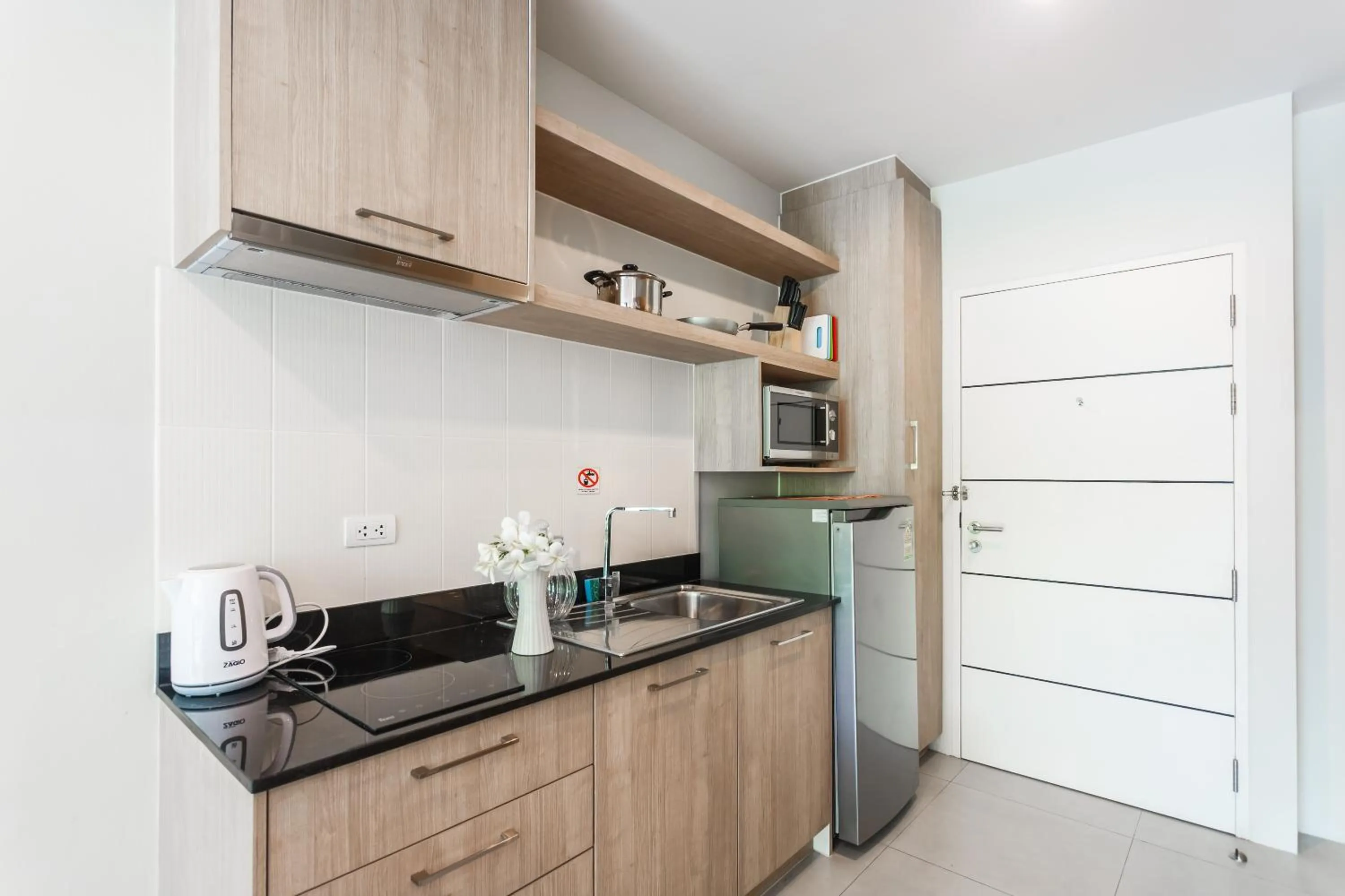 Kitchen or kitchenette in Apartments at The Bliss Condo by Lofty
