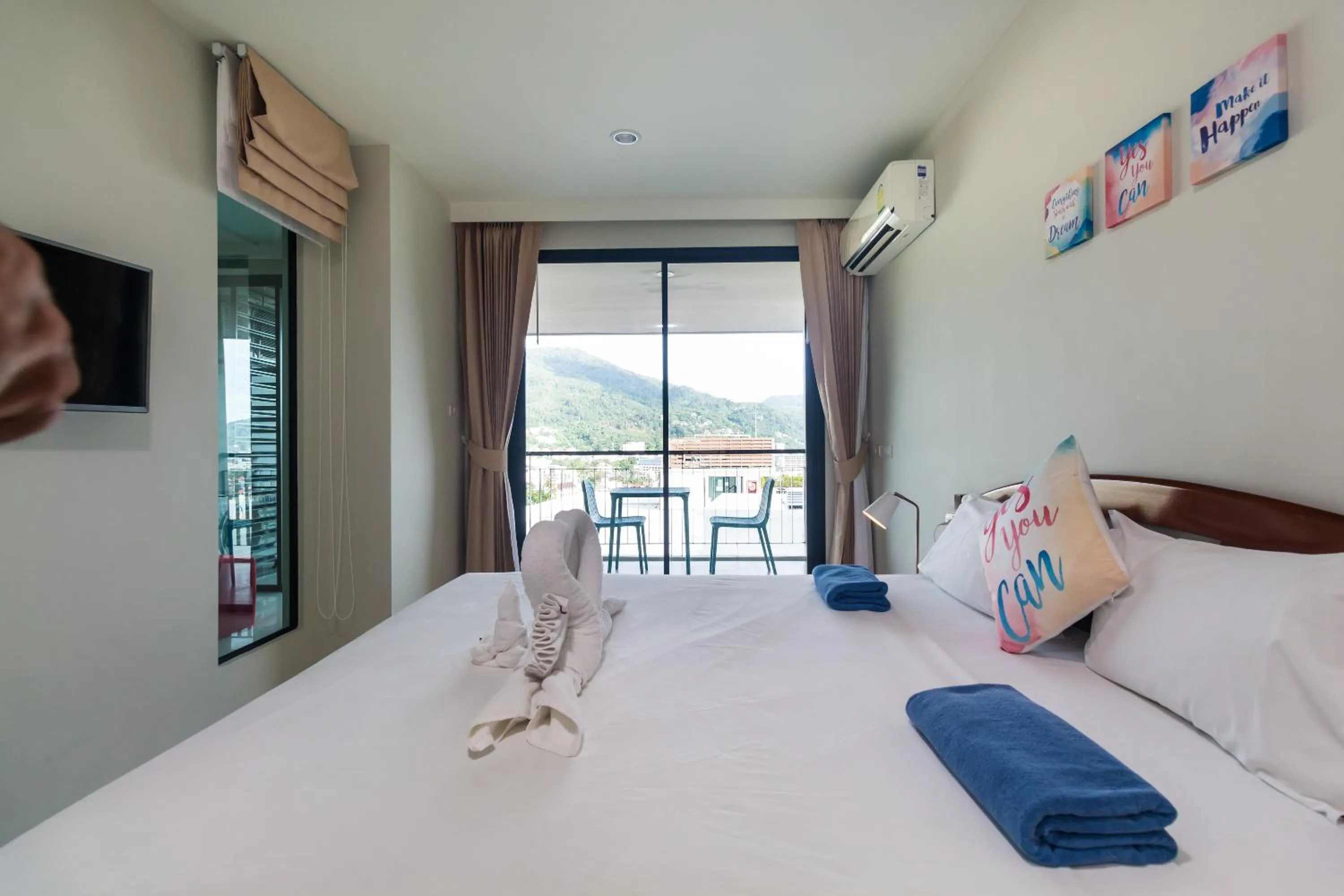 Bedroom, Bed in Apartments at The Bliss Condo by Lofty