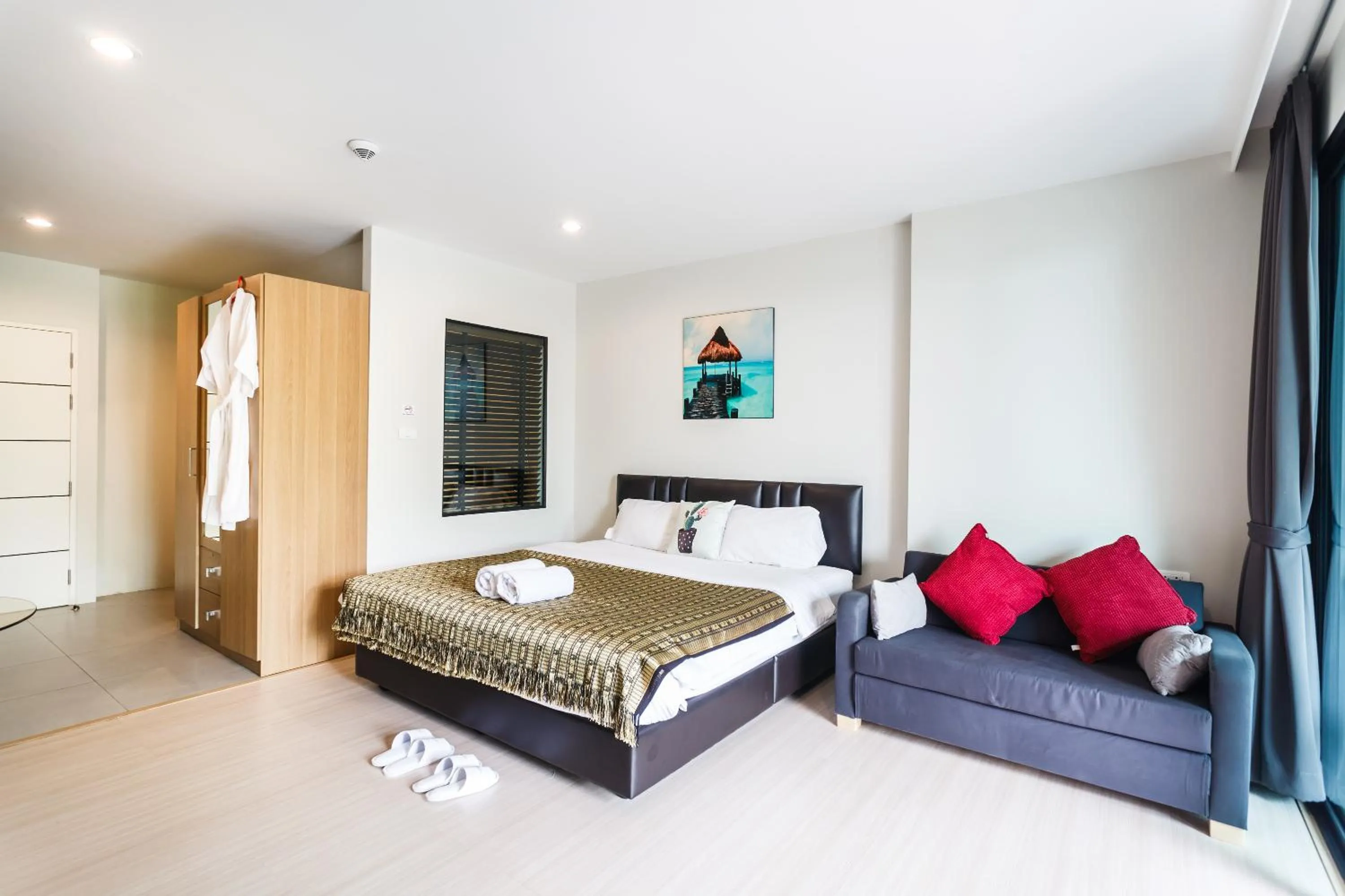 Bedroom, Bed in Apartments at The Bliss Condo by Lofty