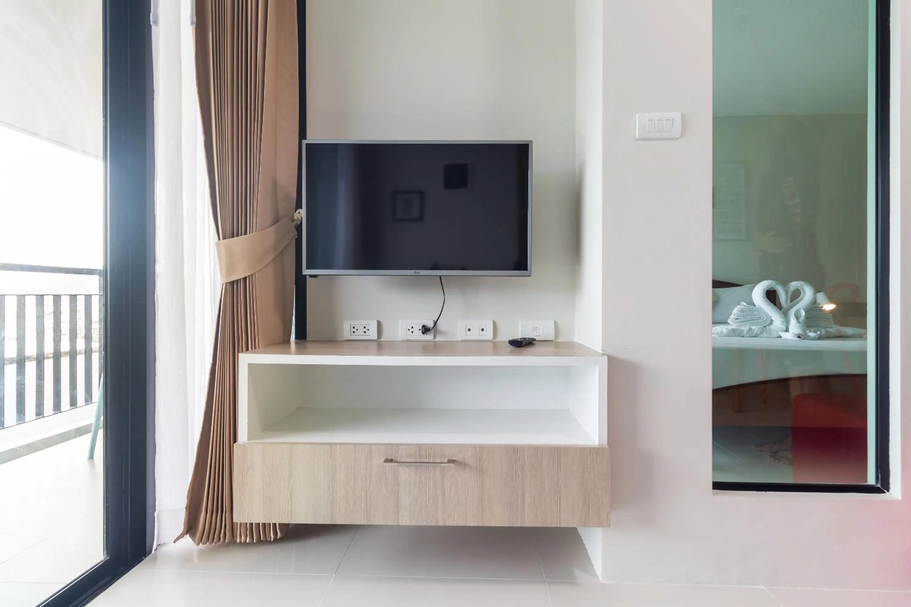 TV and multimedia in Apartments at The Bliss Condo by Lofty