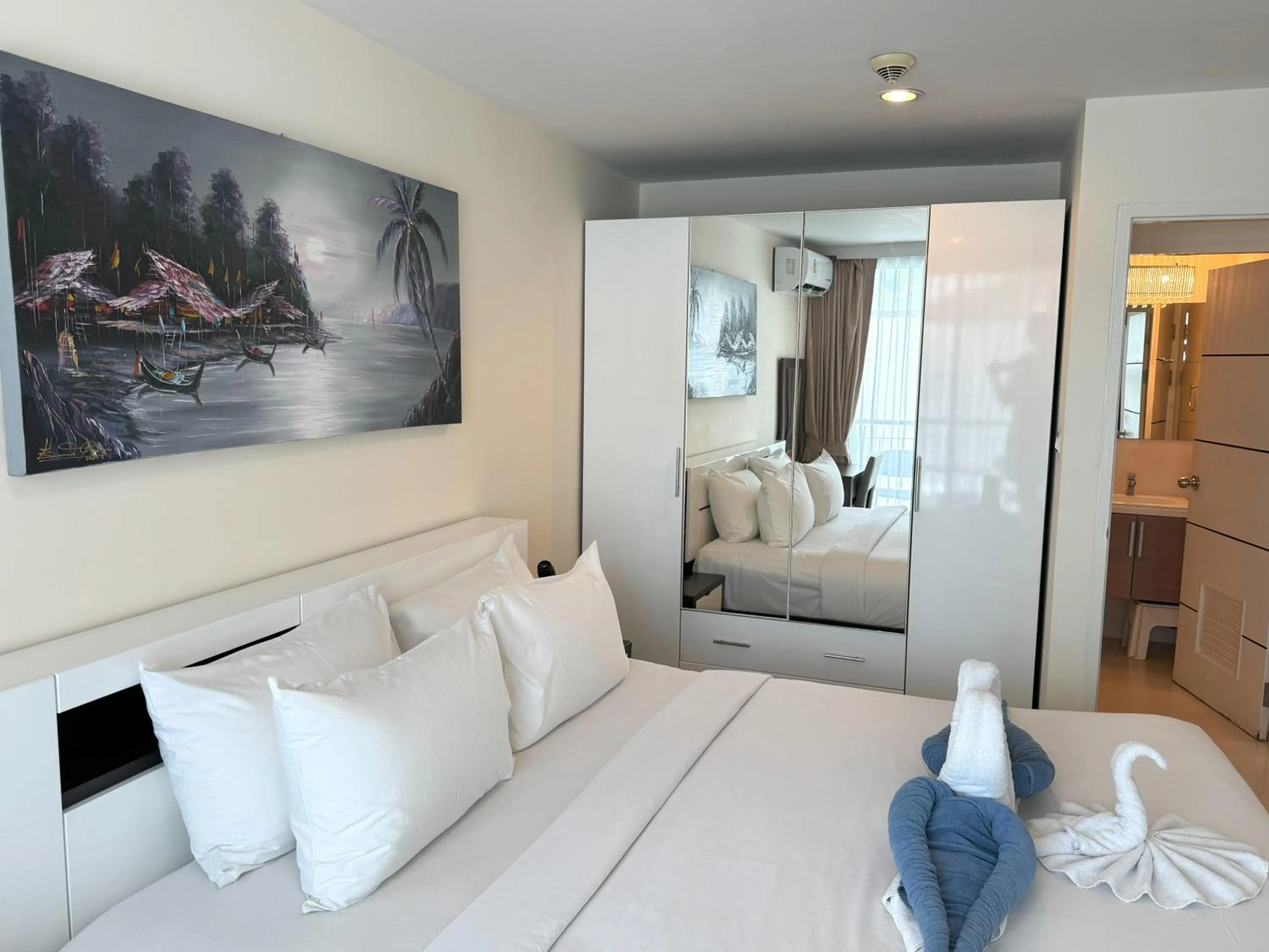 Bed in Apartments at The Bliss Condo by Lofty
