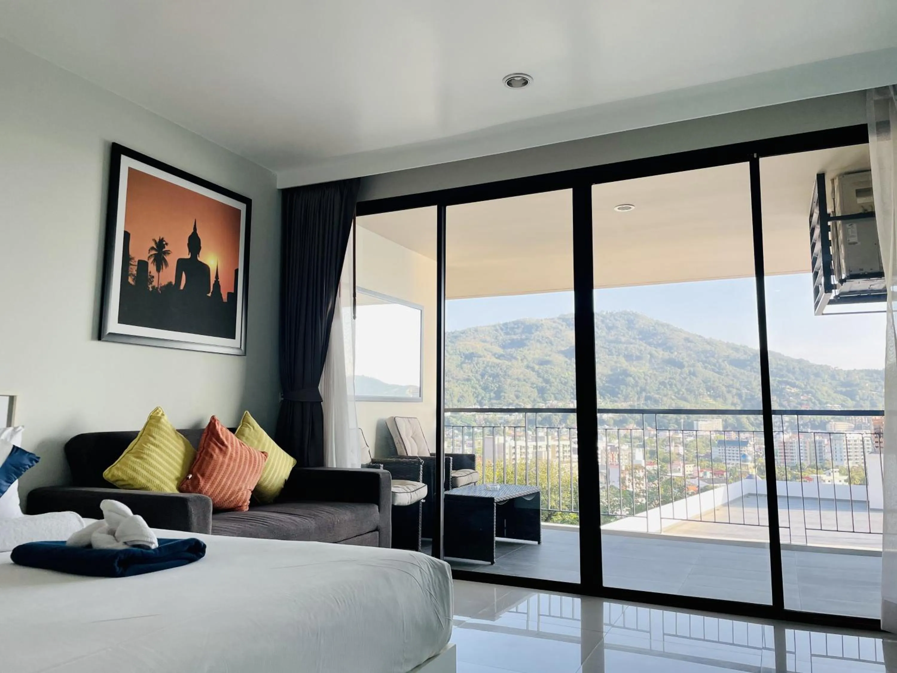Balcony/Terrace, Bed in Apartments at The Bliss Condo by Lofty