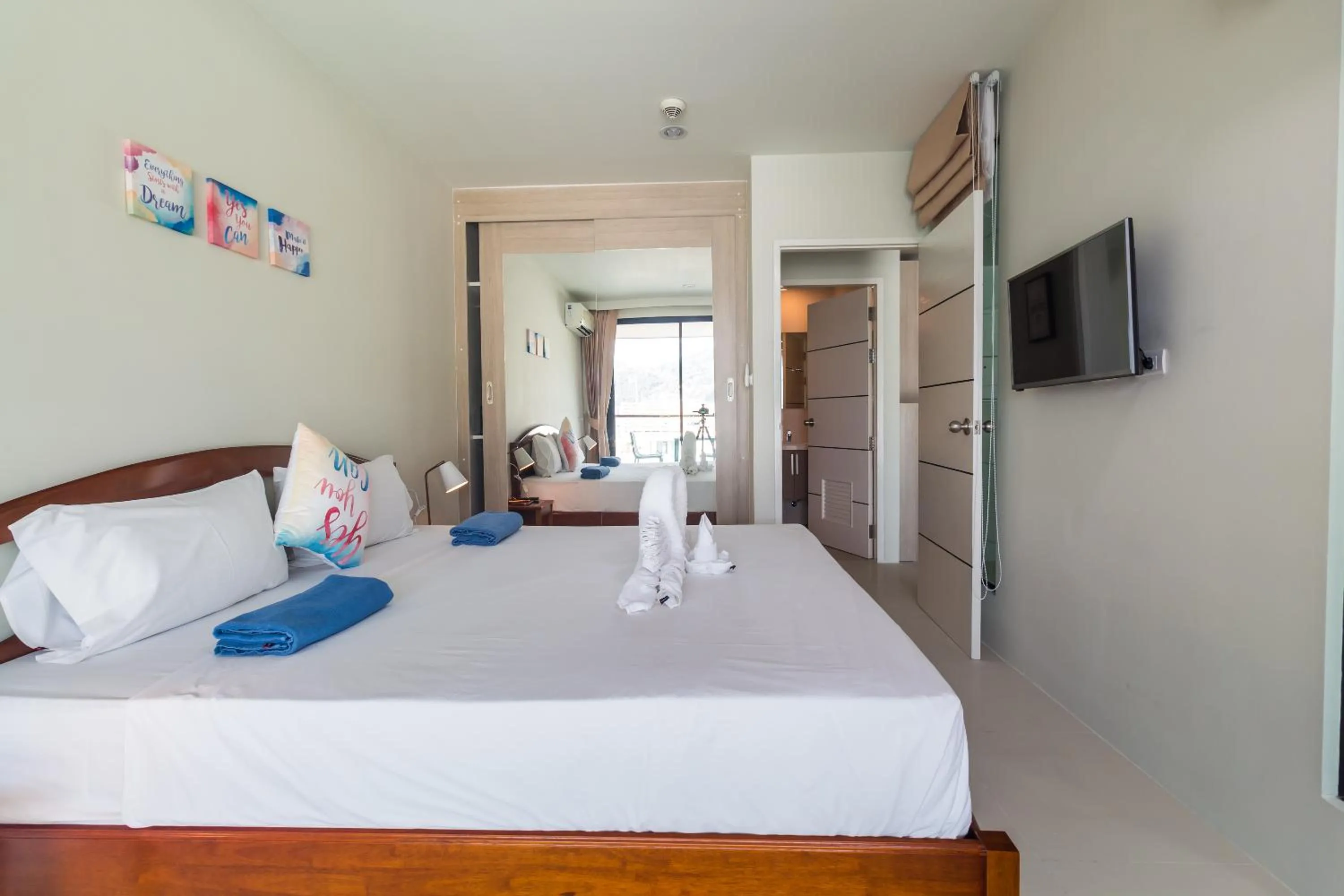 Bedroom, Bed in Apartments at The Bliss Condo by Lofty