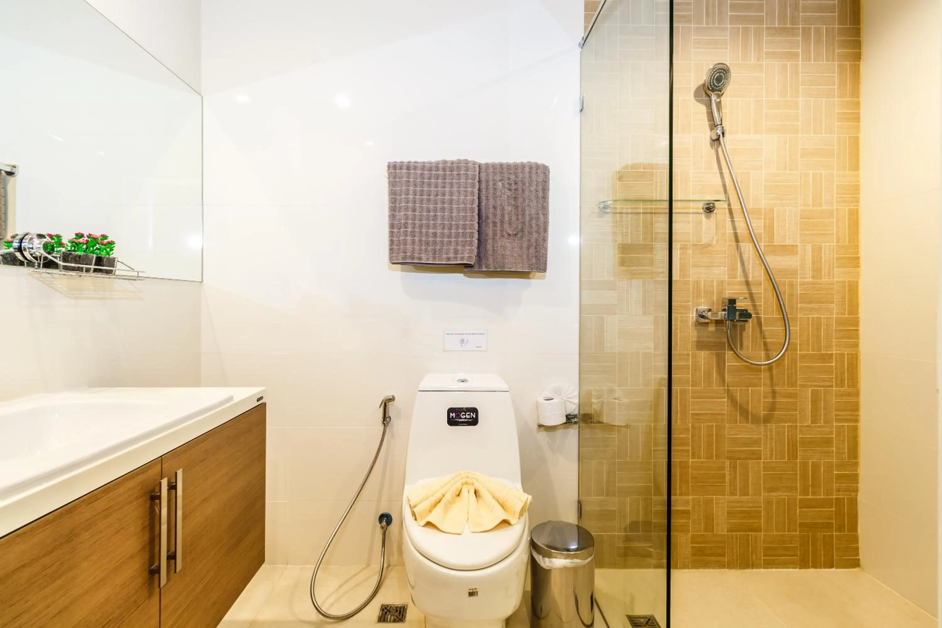 Shower in Apartments at The Bliss Condo by Lofty