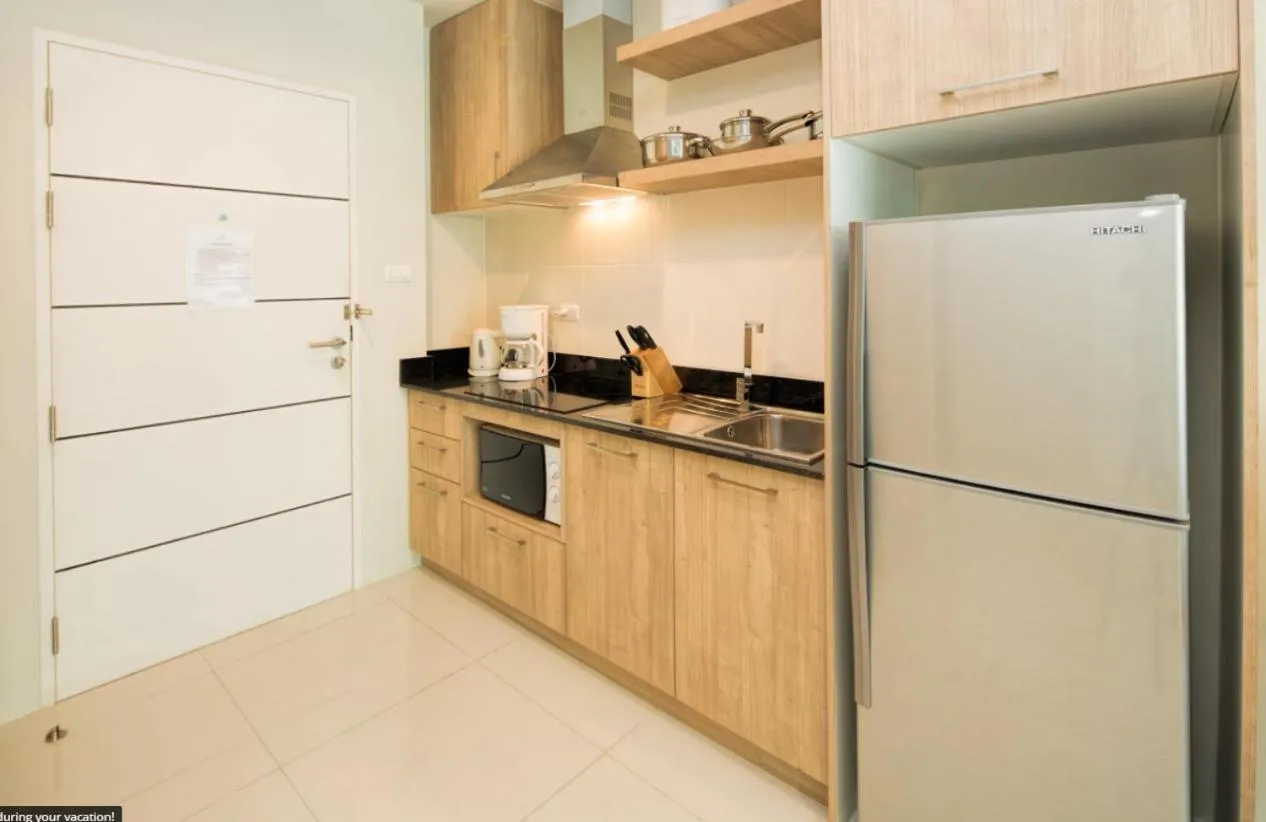 Kitchen or kitchenette in Apartments at The Bliss Condo by Lofty