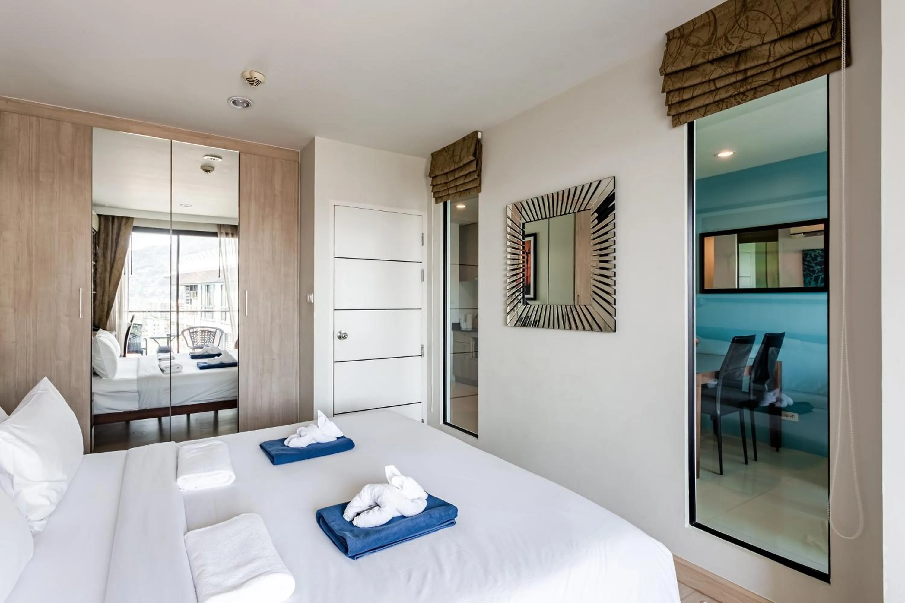 Bed in Apartments at The Bliss Condo by Lofty