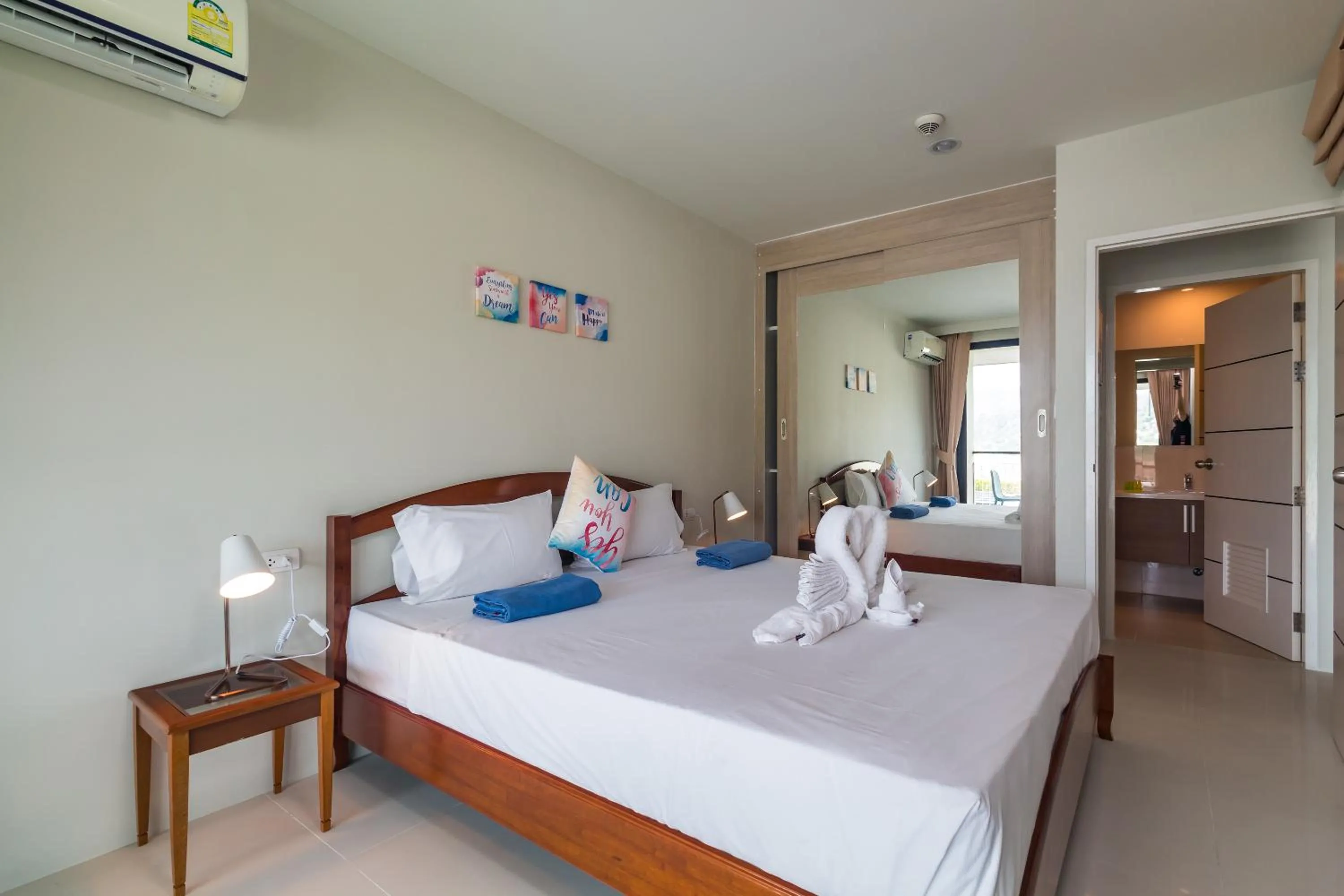 Bathroom, Bed in Apartments at The Bliss Condo by Lofty