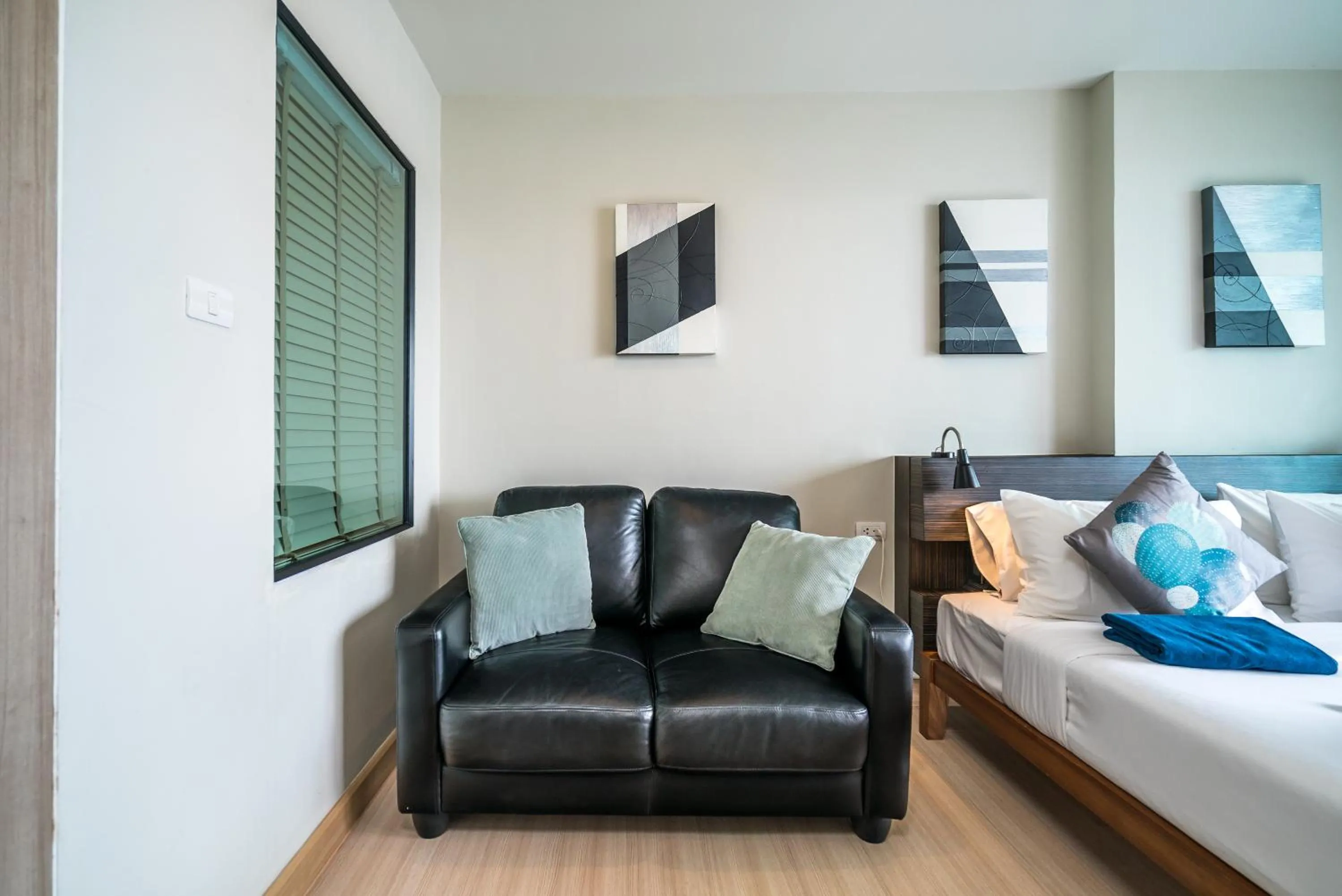 Seating area, Bed in Apartments at The Bliss Condo by Lofty