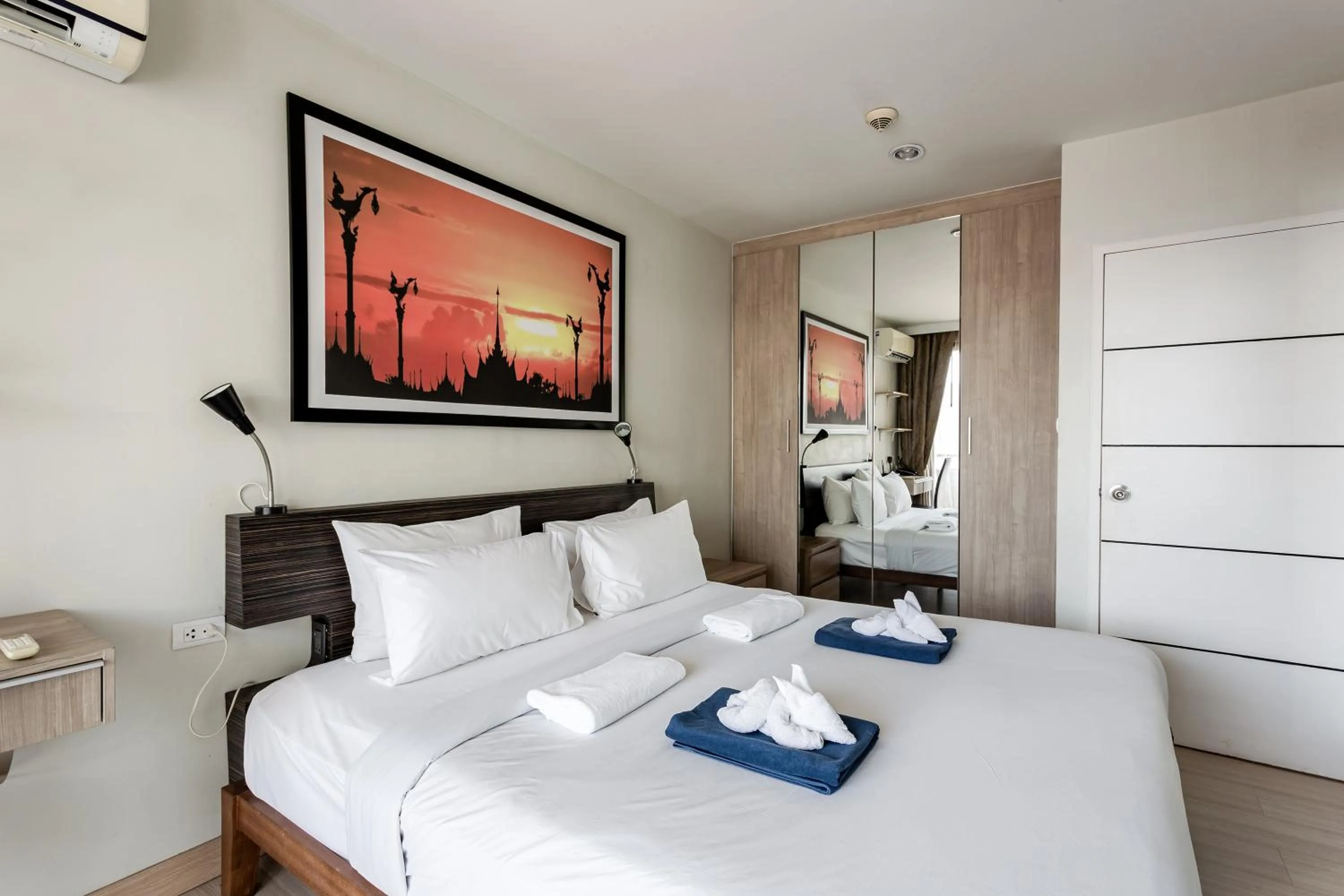 Bed in Apartments at The Bliss Condo by Lofty