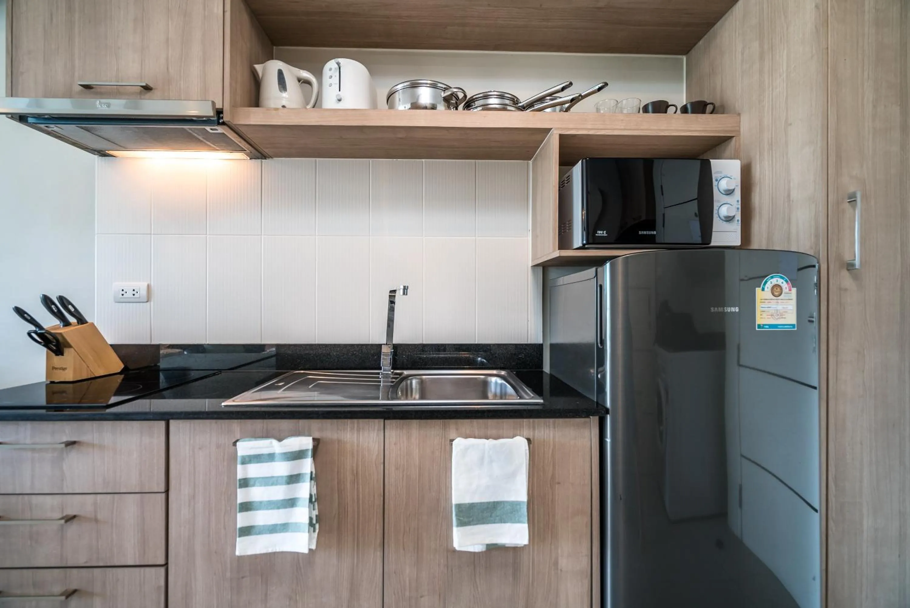 Kitchen or kitchenette in Apartments at The Bliss Condo by Lofty
