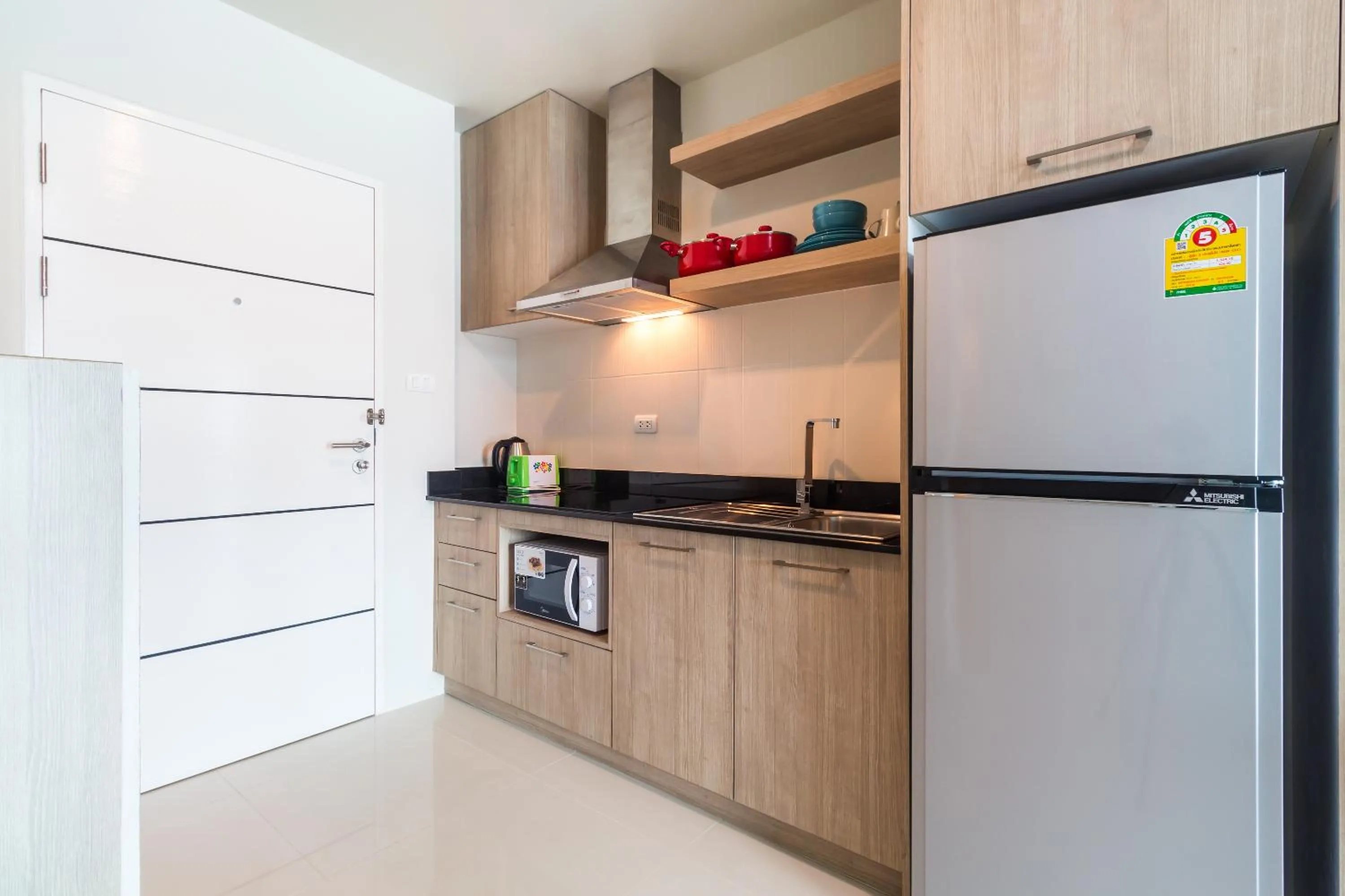 Kitchen or kitchenette in Apartments at The Bliss Condo by Lofty