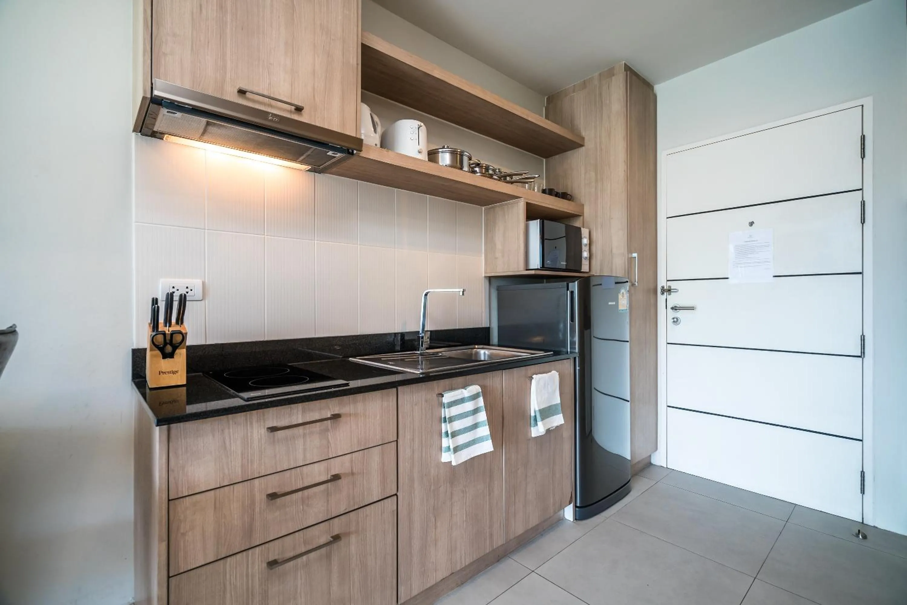 Kitchen or kitchenette in Apartments at The Bliss Condo by Lofty