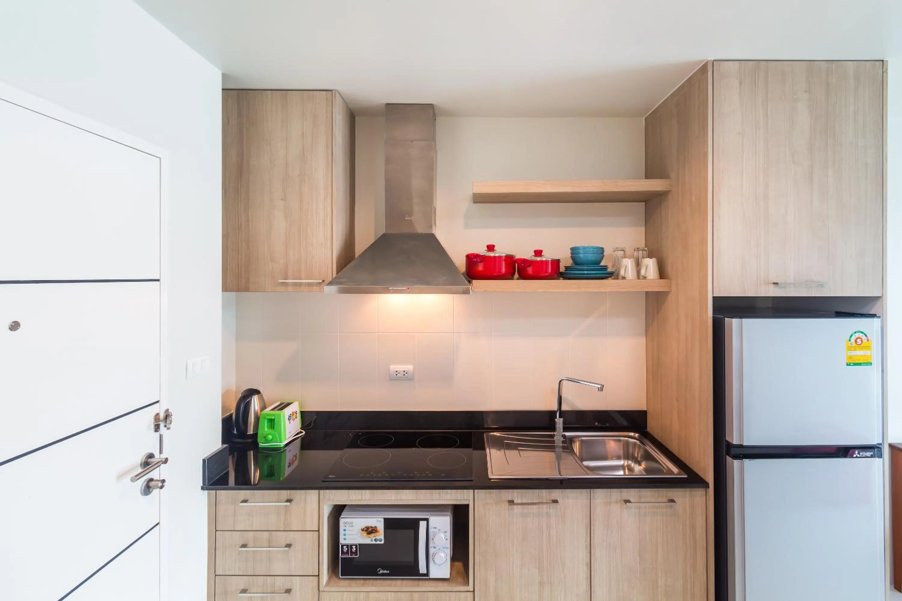 Kitchen or kitchenette in Apartments at The Bliss Condo by Lofty