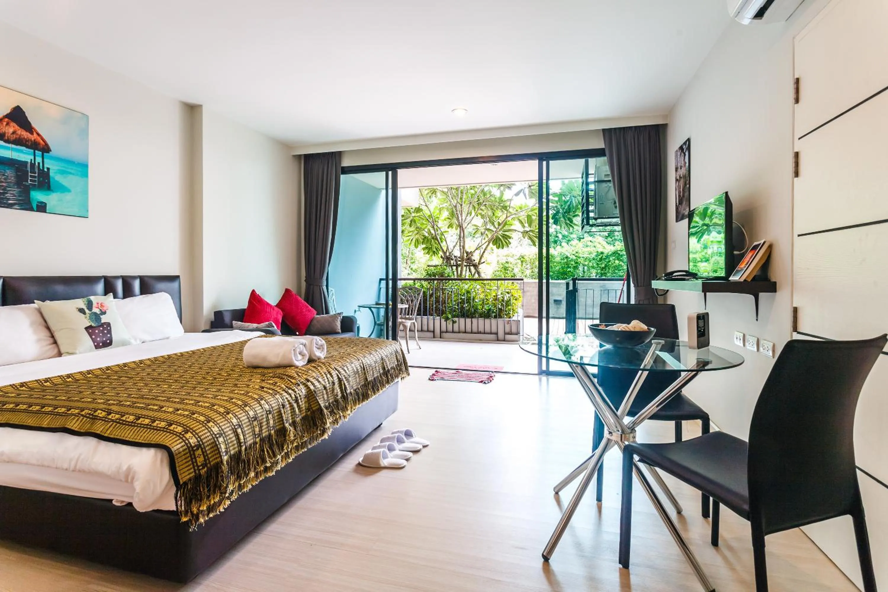 Balcony/Terrace, Bed in Apartments at The Bliss Condo by Lofty