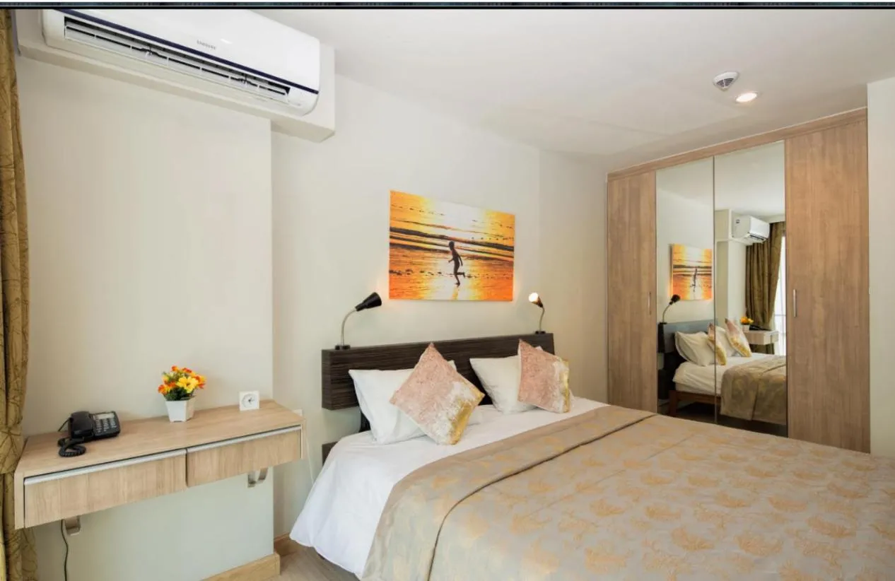 Photo of the whole room, Bed in Apartments at The Bliss Condo by Lofty