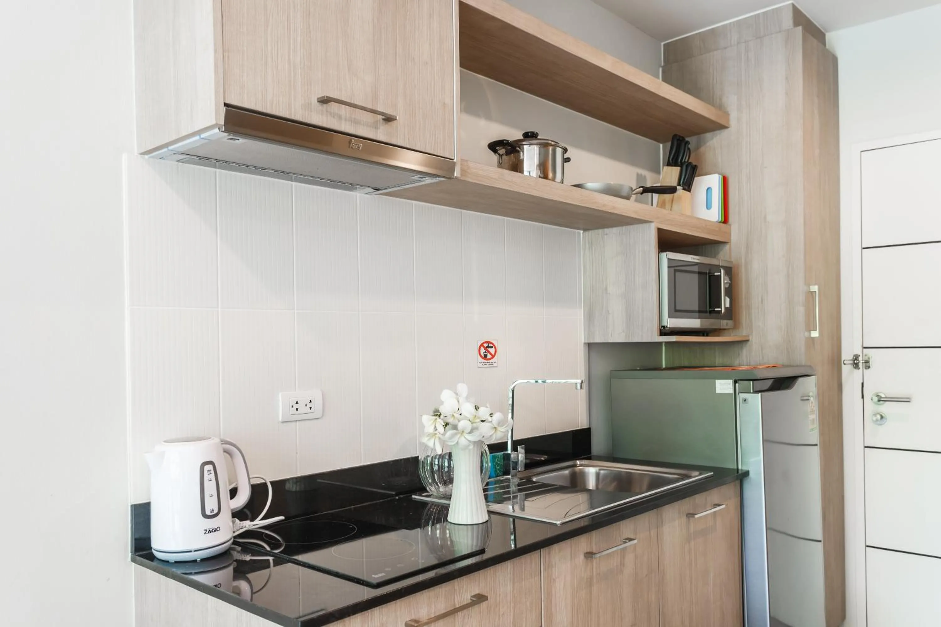 Kitchen or kitchenette in Apartments at The Bliss Condo by Lofty