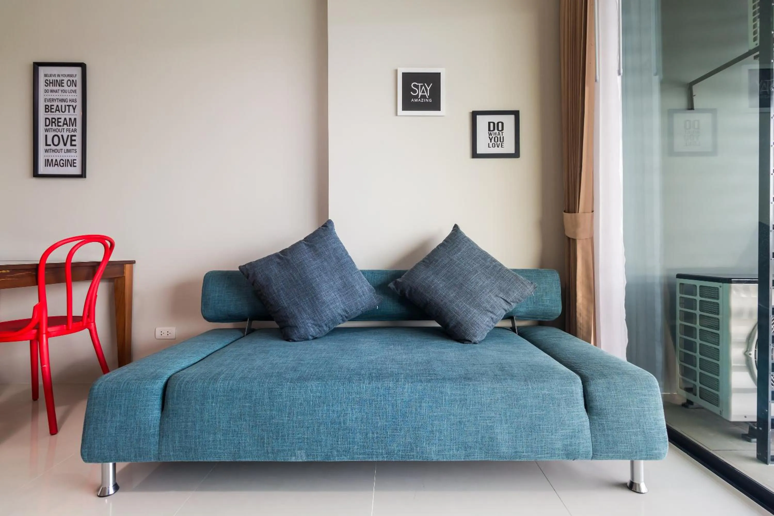 Living room in Apartments at The Bliss Condo by Lofty