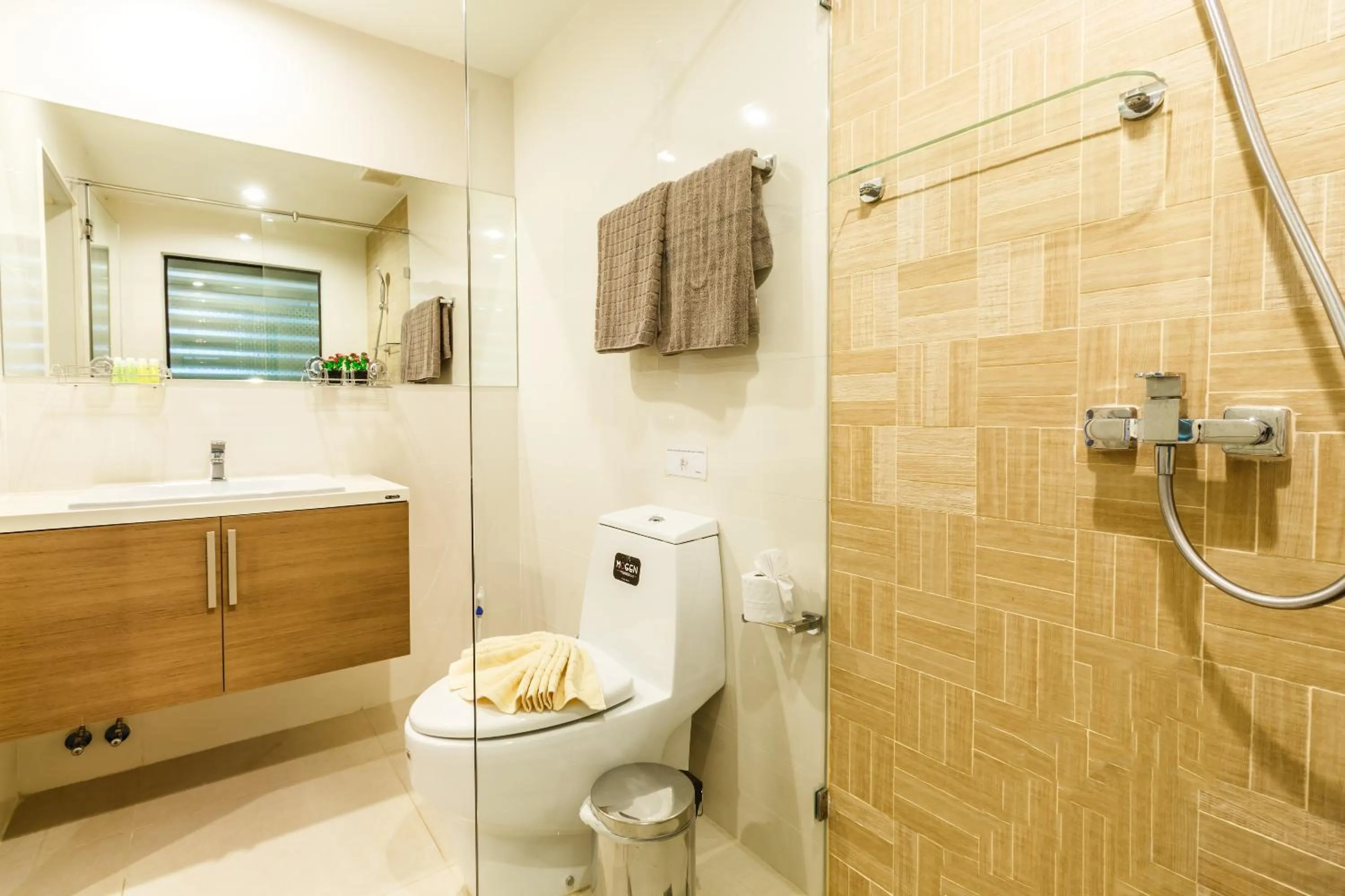 Shower in Apartments at The Bliss Condo by Lofty