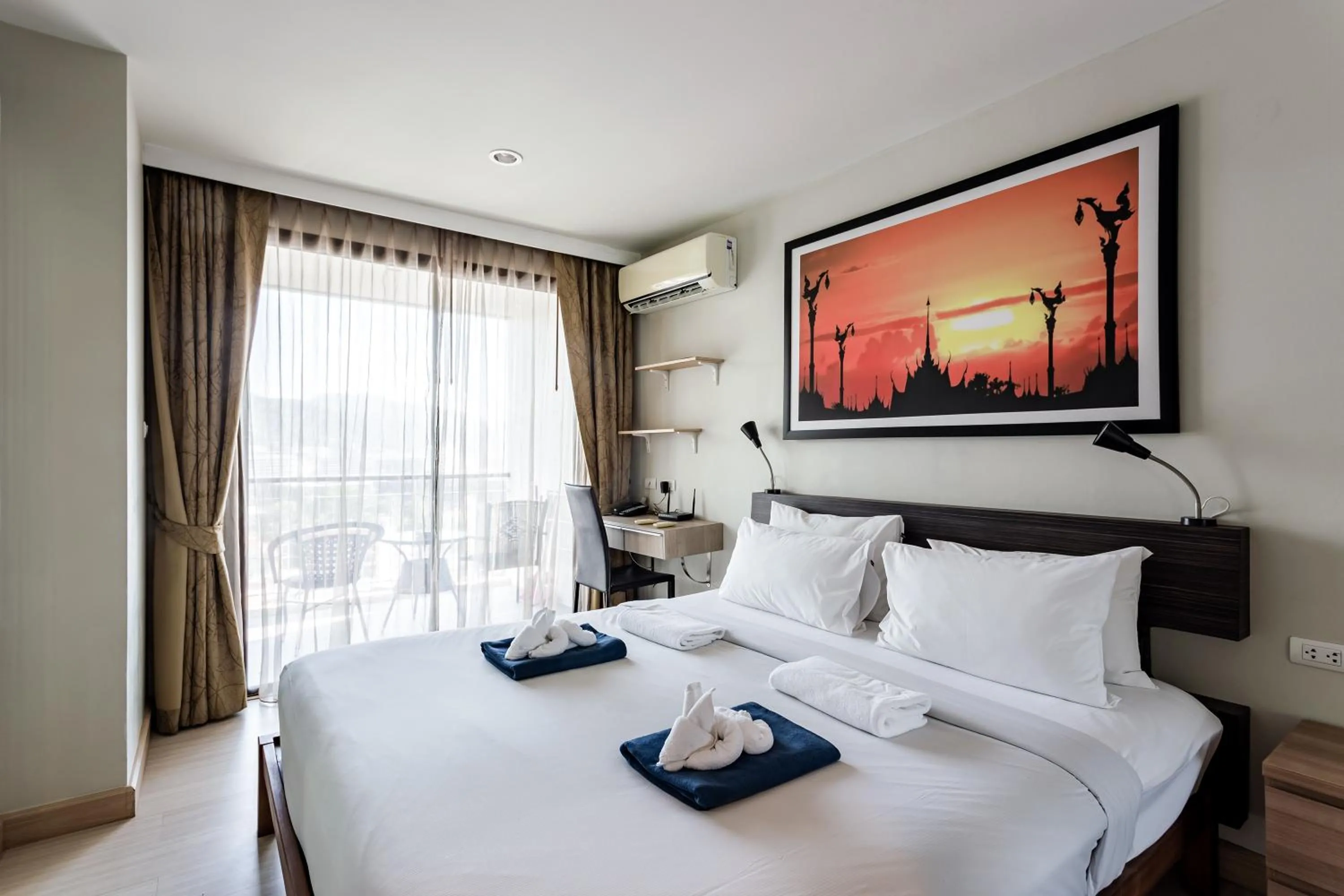 Bed in Apartments at The Bliss Condo by Lofty