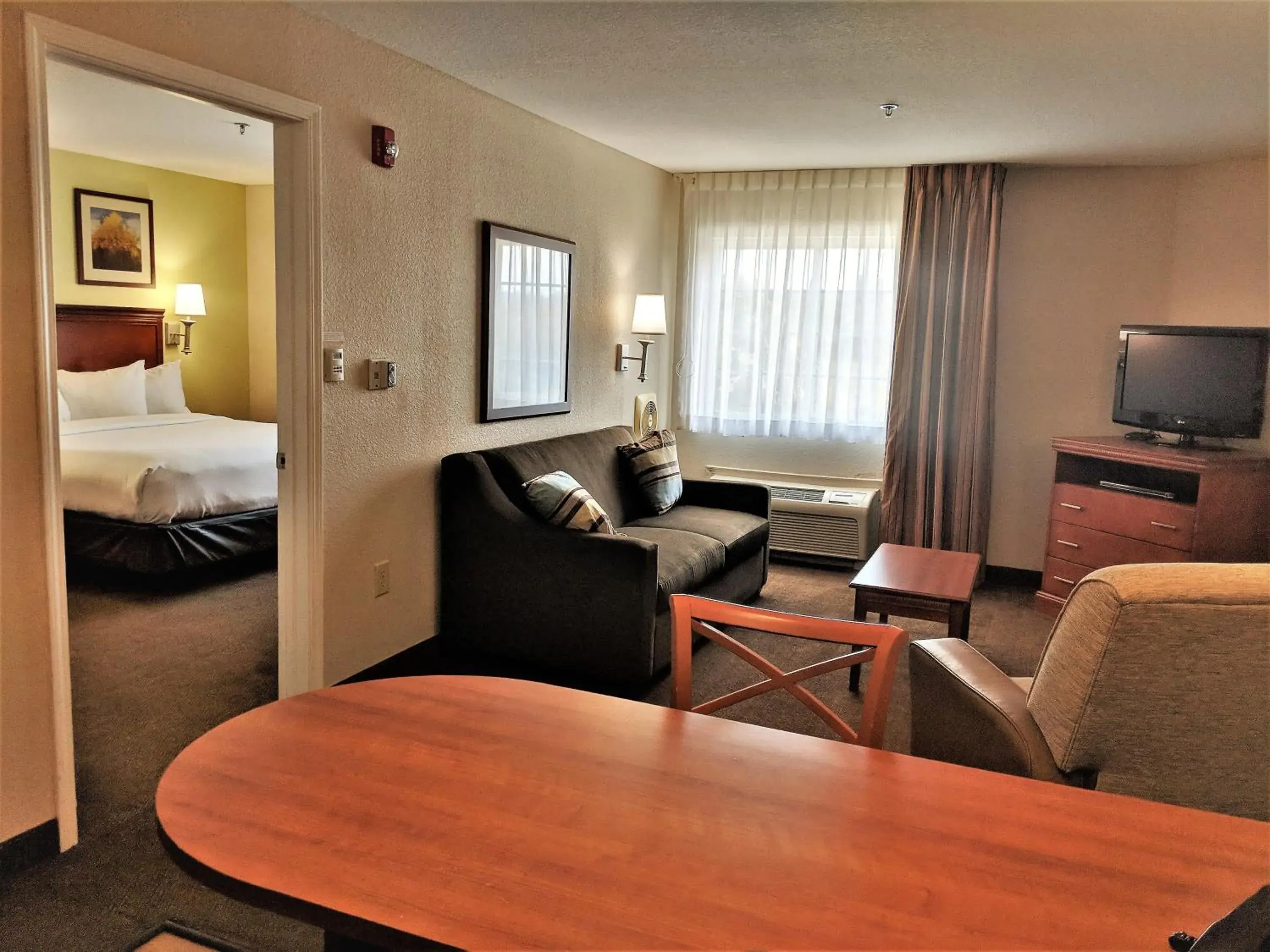 Bedroom, Seating Area in Candlewood Suites Macon