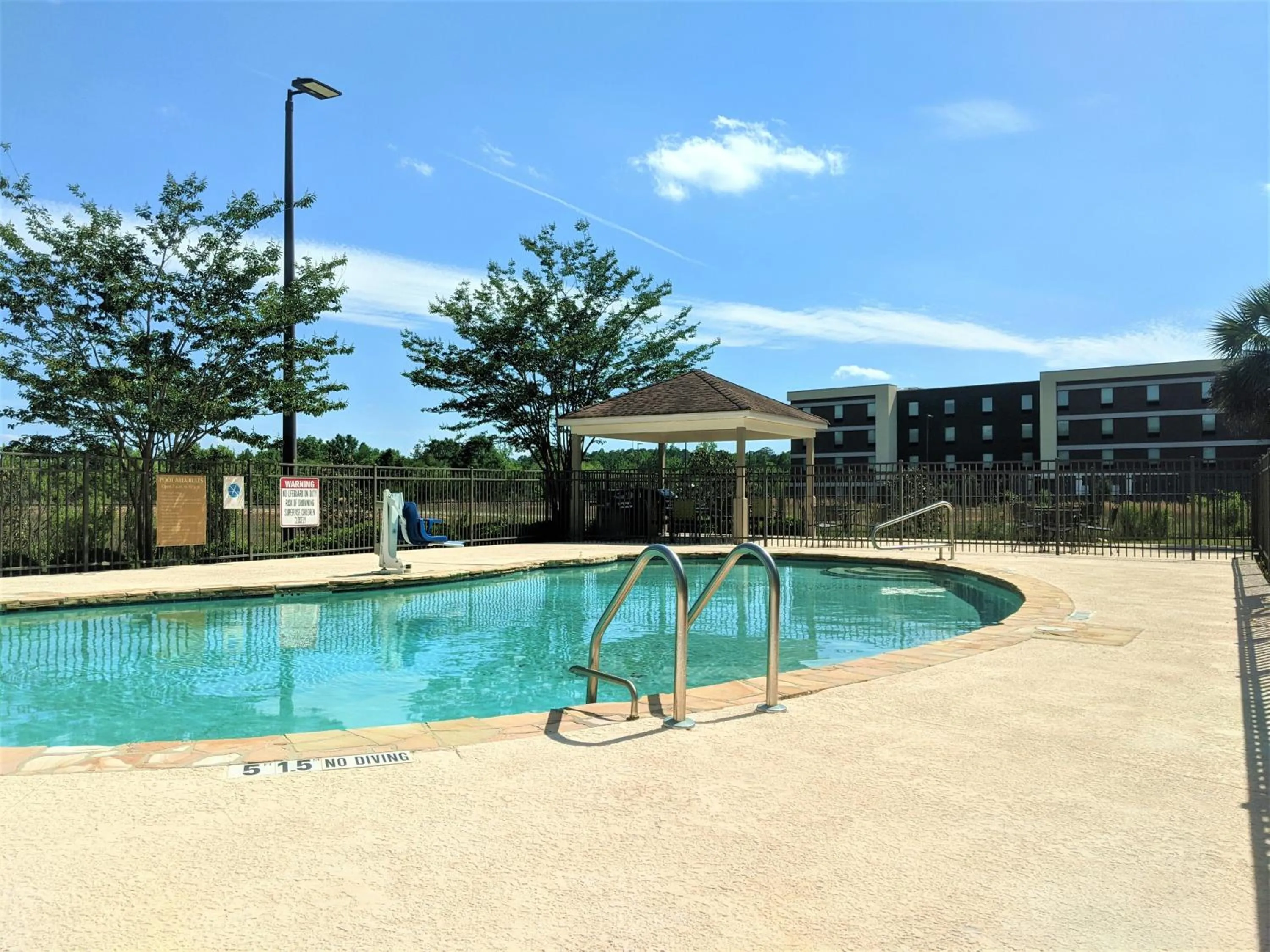 Swimming pool in Candlewood Suites Macon by IHG