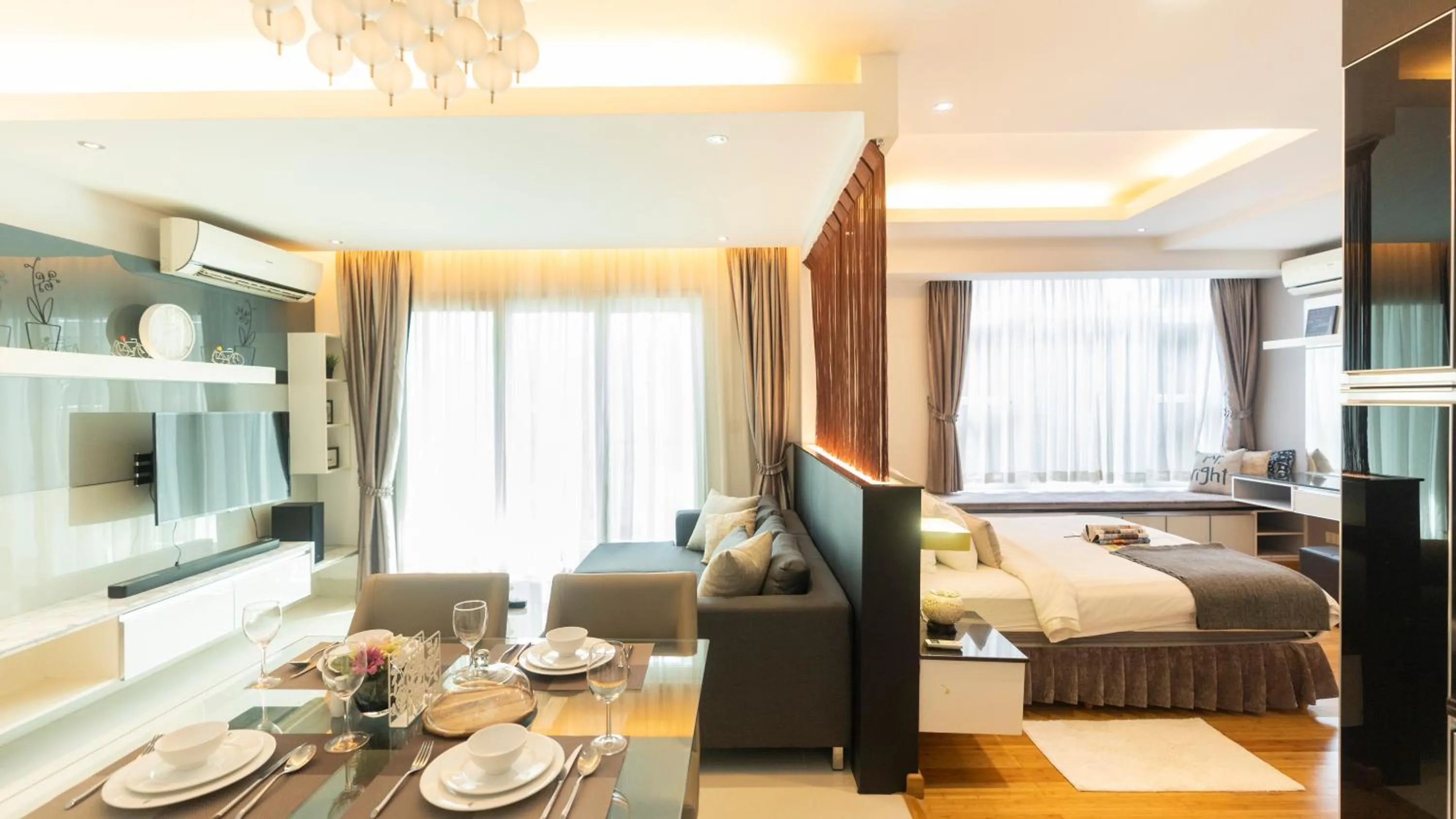 Living room, Bed in Naki Suites @ Silvertown