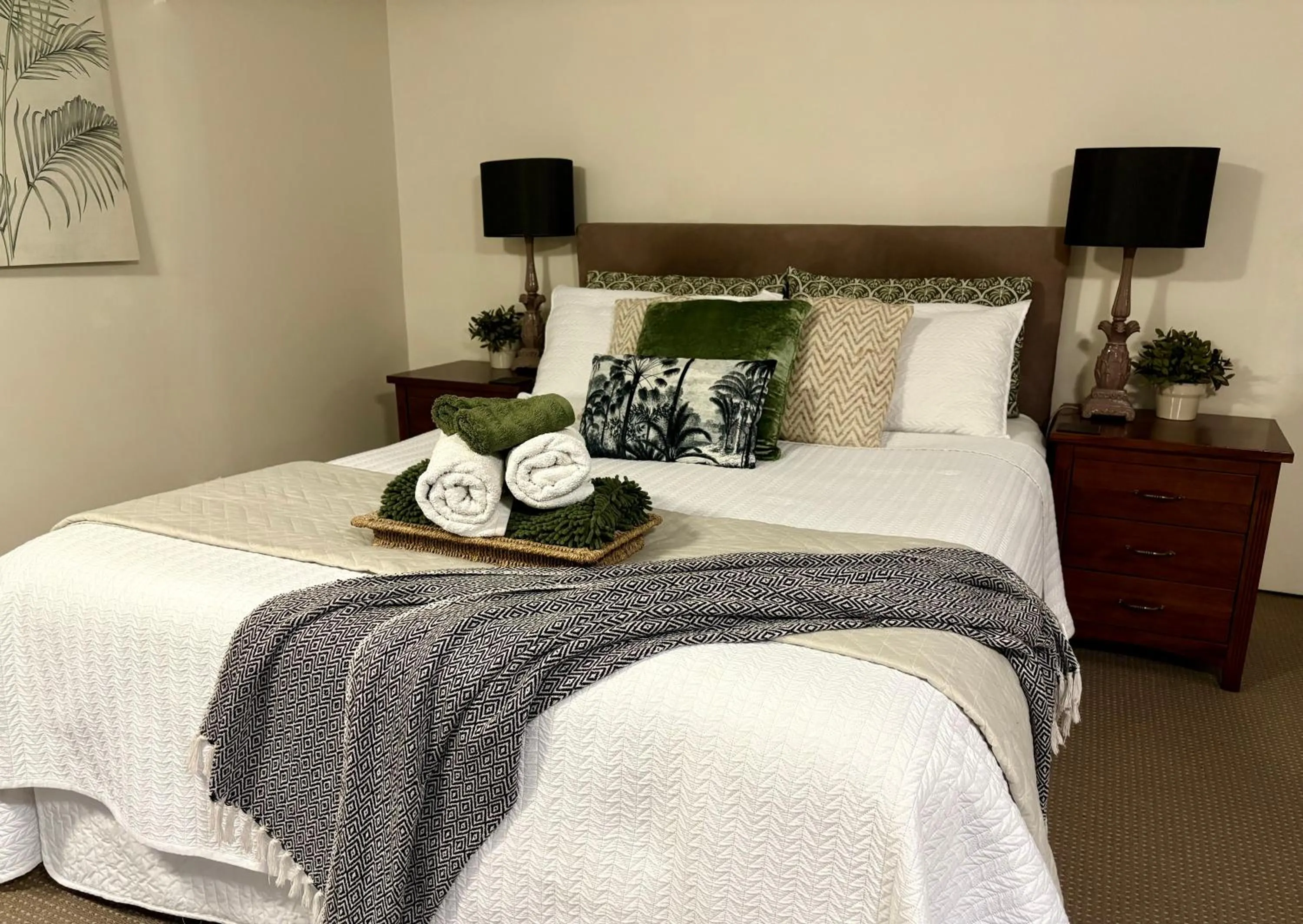 Bed in Jacaranda House Garden Suite