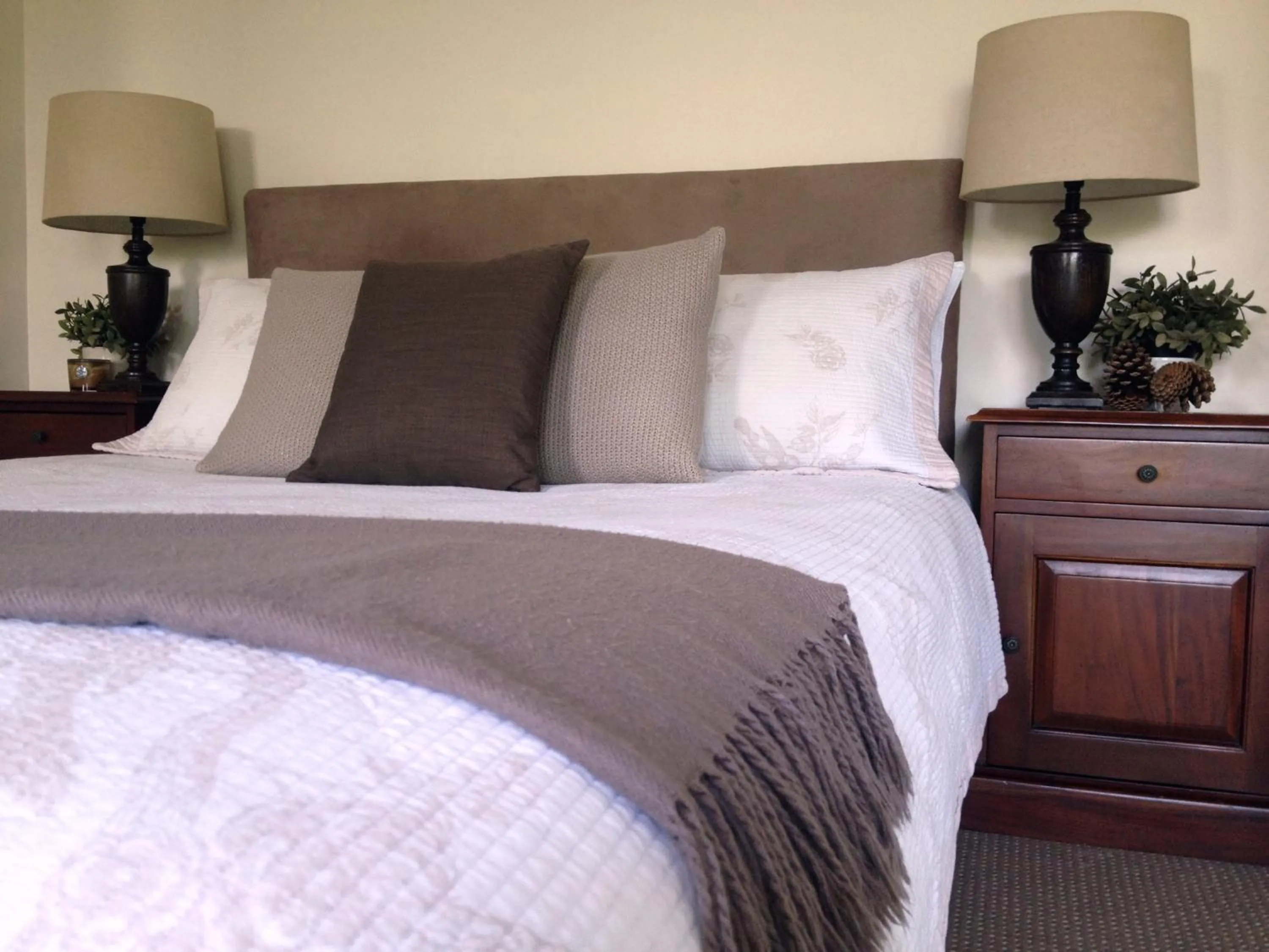 Bed in Jacaranda House Garden Suite